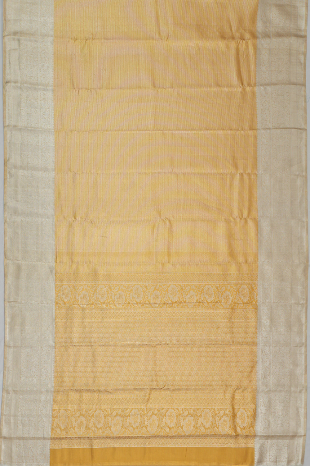 Taranga Kanchi Silk Tissue Lines Gold Saree