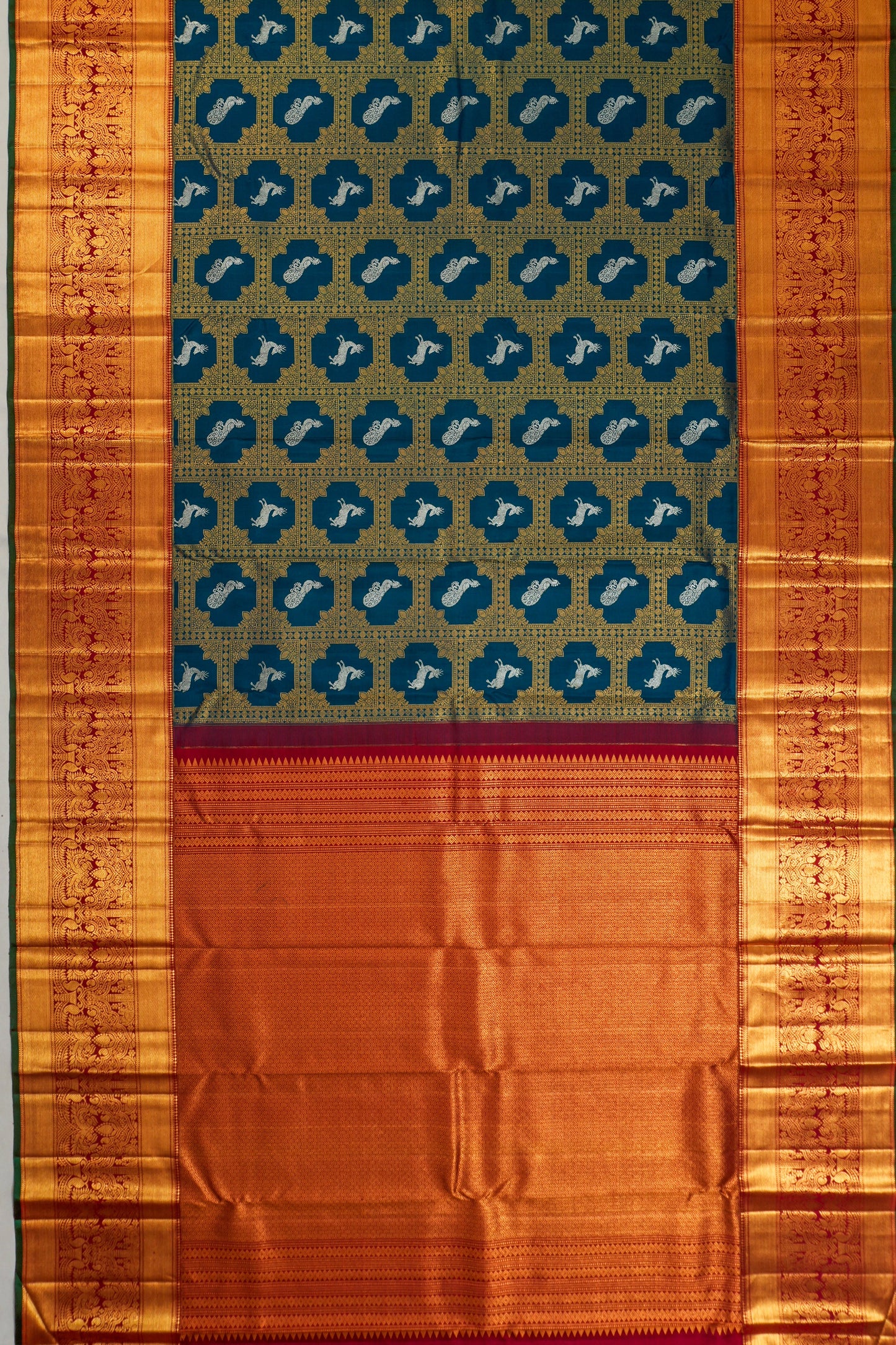 Kanchipuram Silk Brocade And Butta Teal Blue Saree