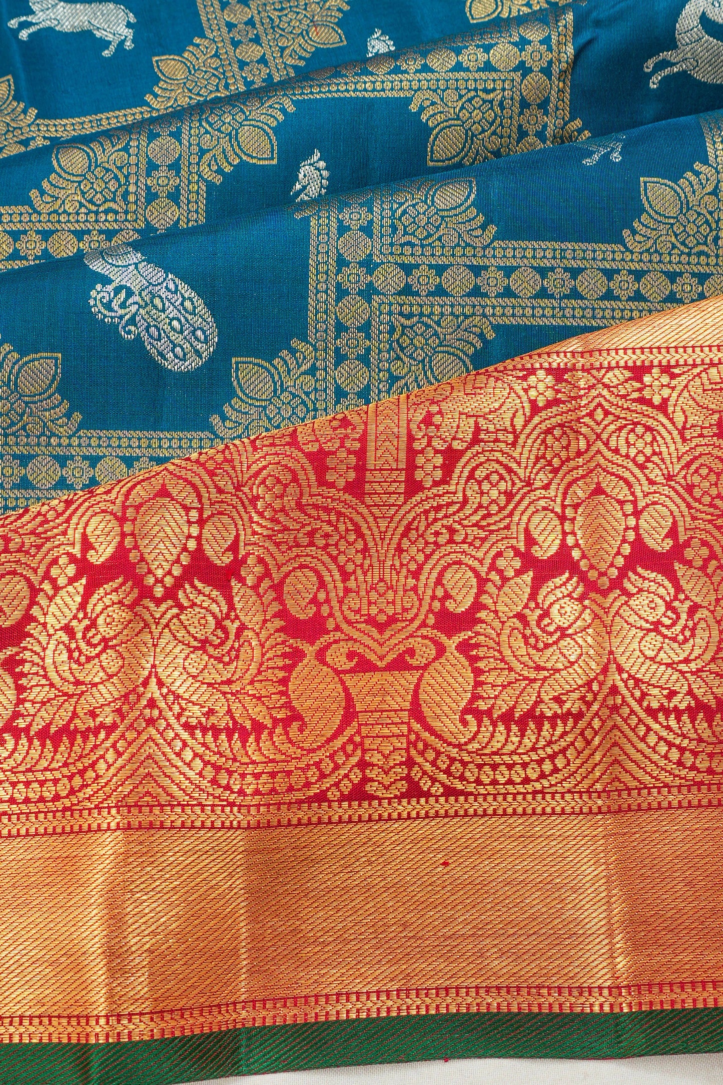 Kanchipuram Silk Brocade And Butta Teal Blue Saree