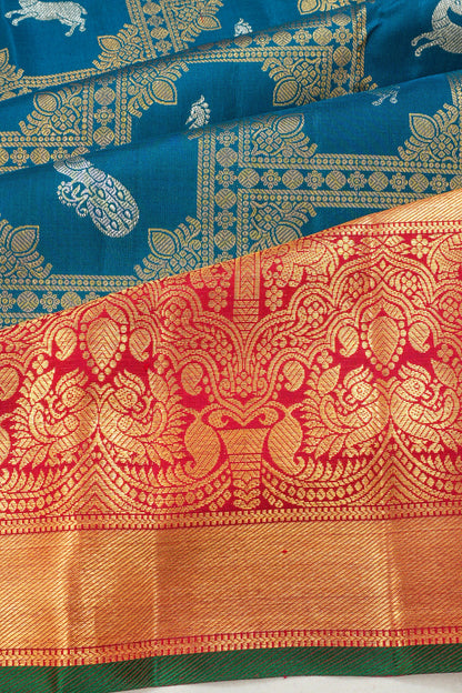 Kanchipuram Silk Brocade And Butta Teal Blue Saree