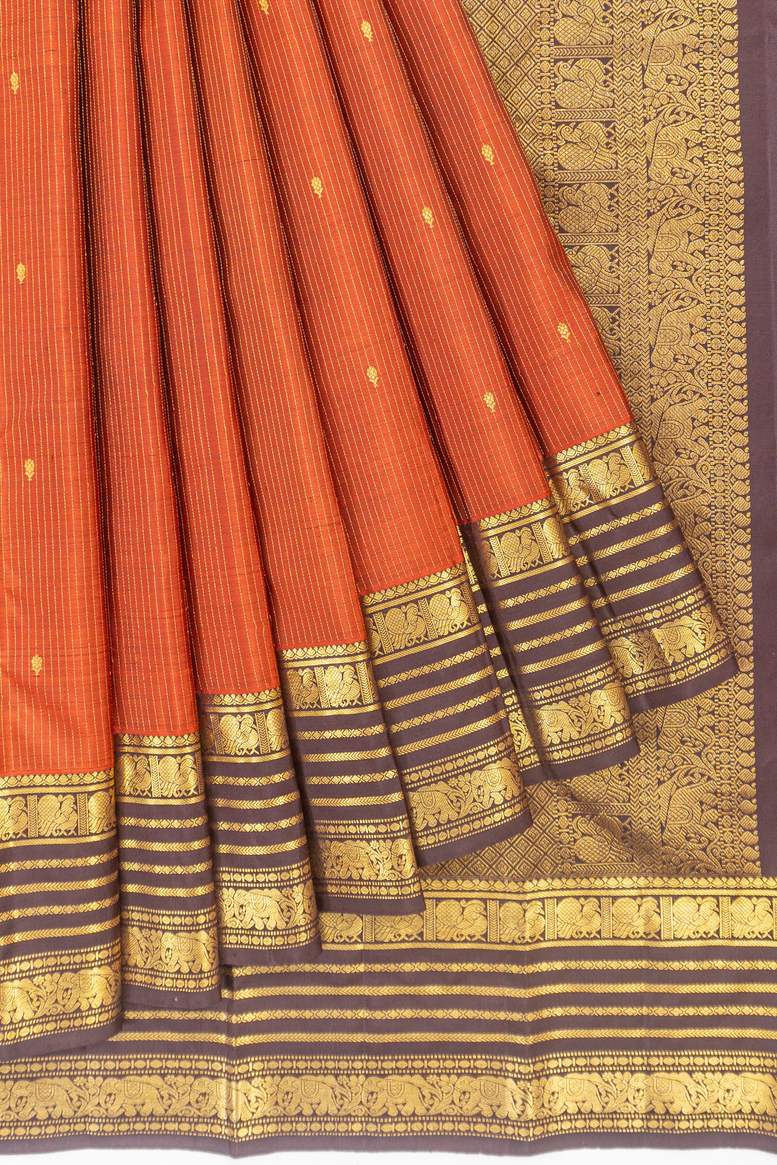 Kanchipuram Silk Oosi Lines And Butta Rust Orange Saree