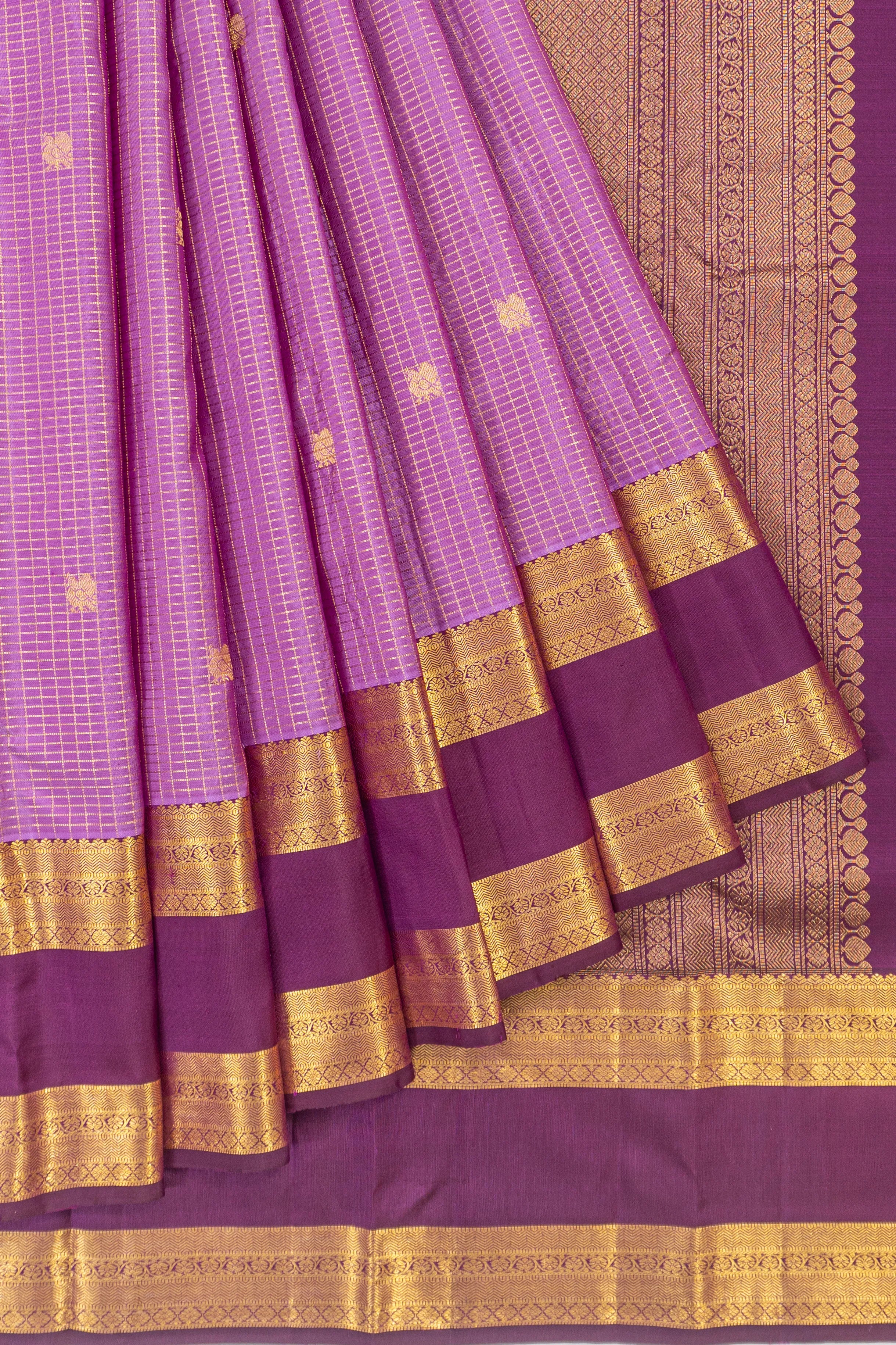 Kanchipuram Silk Checks And Butta Rust Lavender Saree With Rettai Pettu Border
