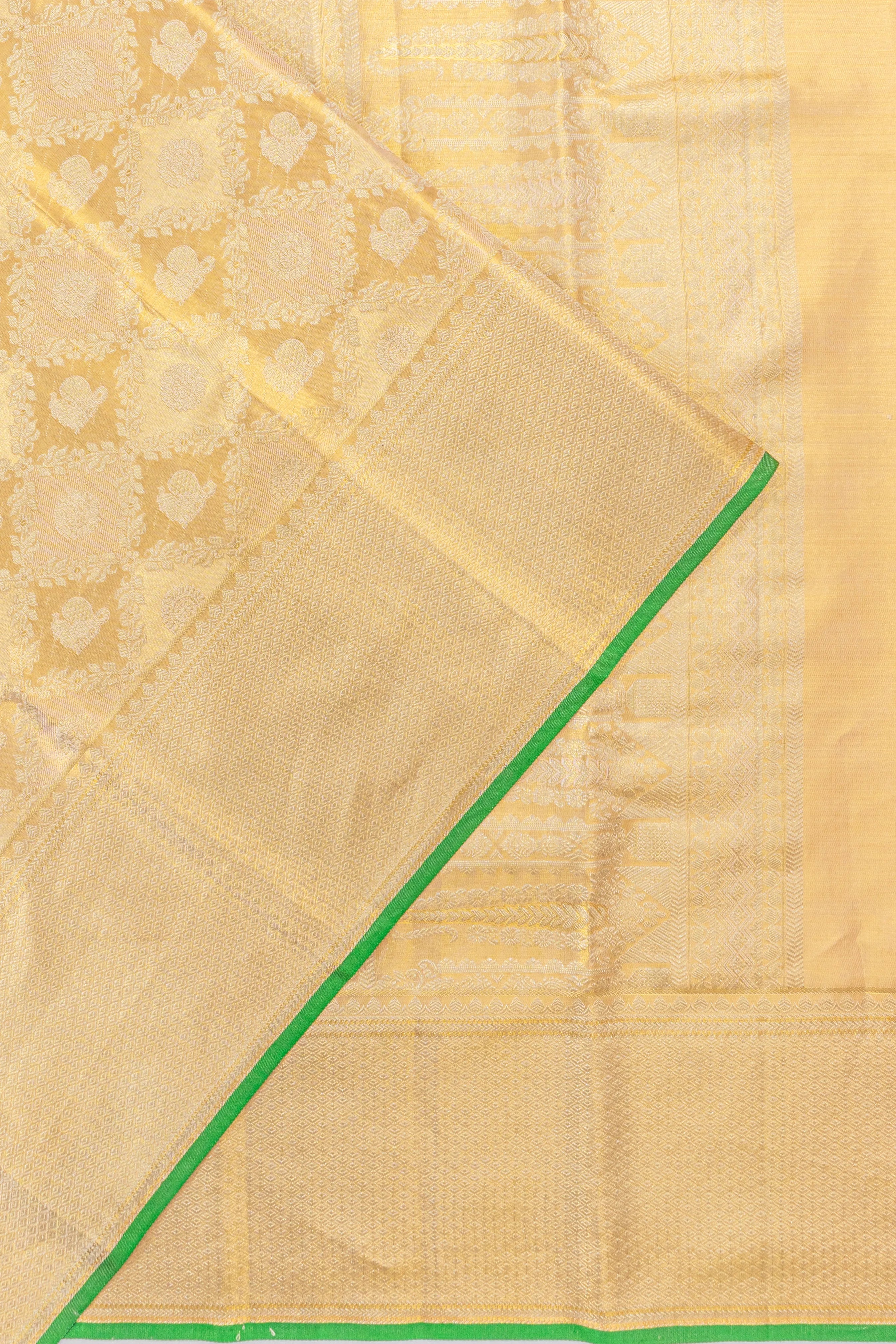 Taranga Kanchi Silk Tissue Brocade Gold Saree