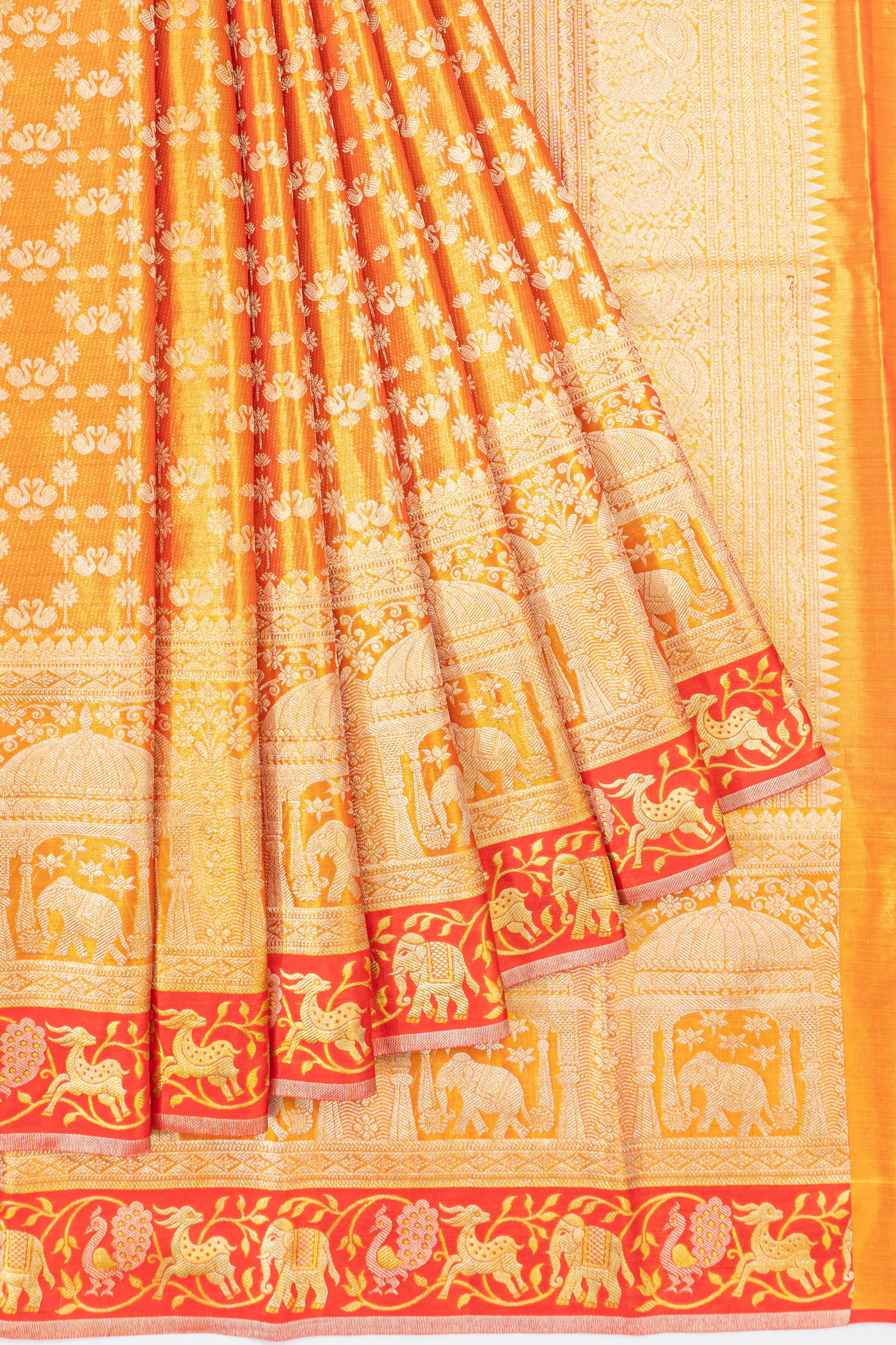 Taranga Kanchi Silk Tissue Brocade Orange Saree