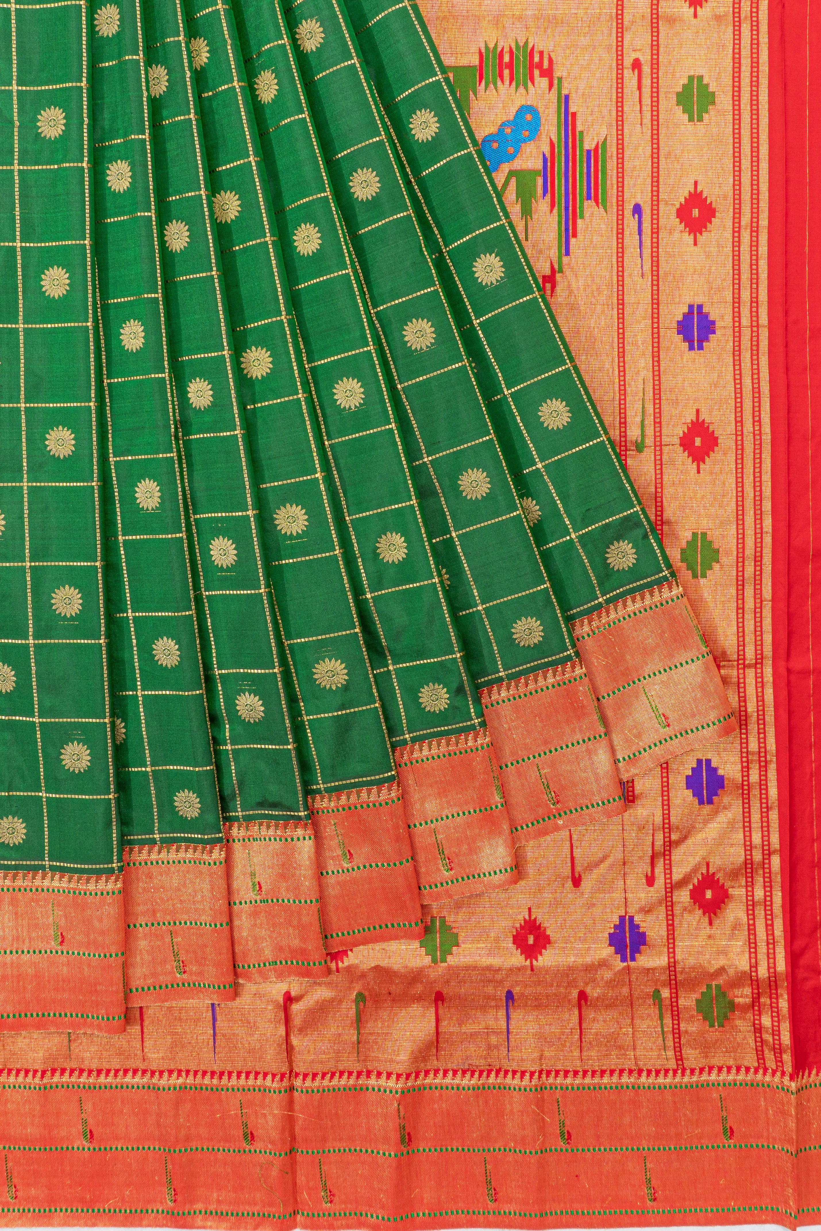 Muniya Silk Checks And Butta Bottle Green Saree