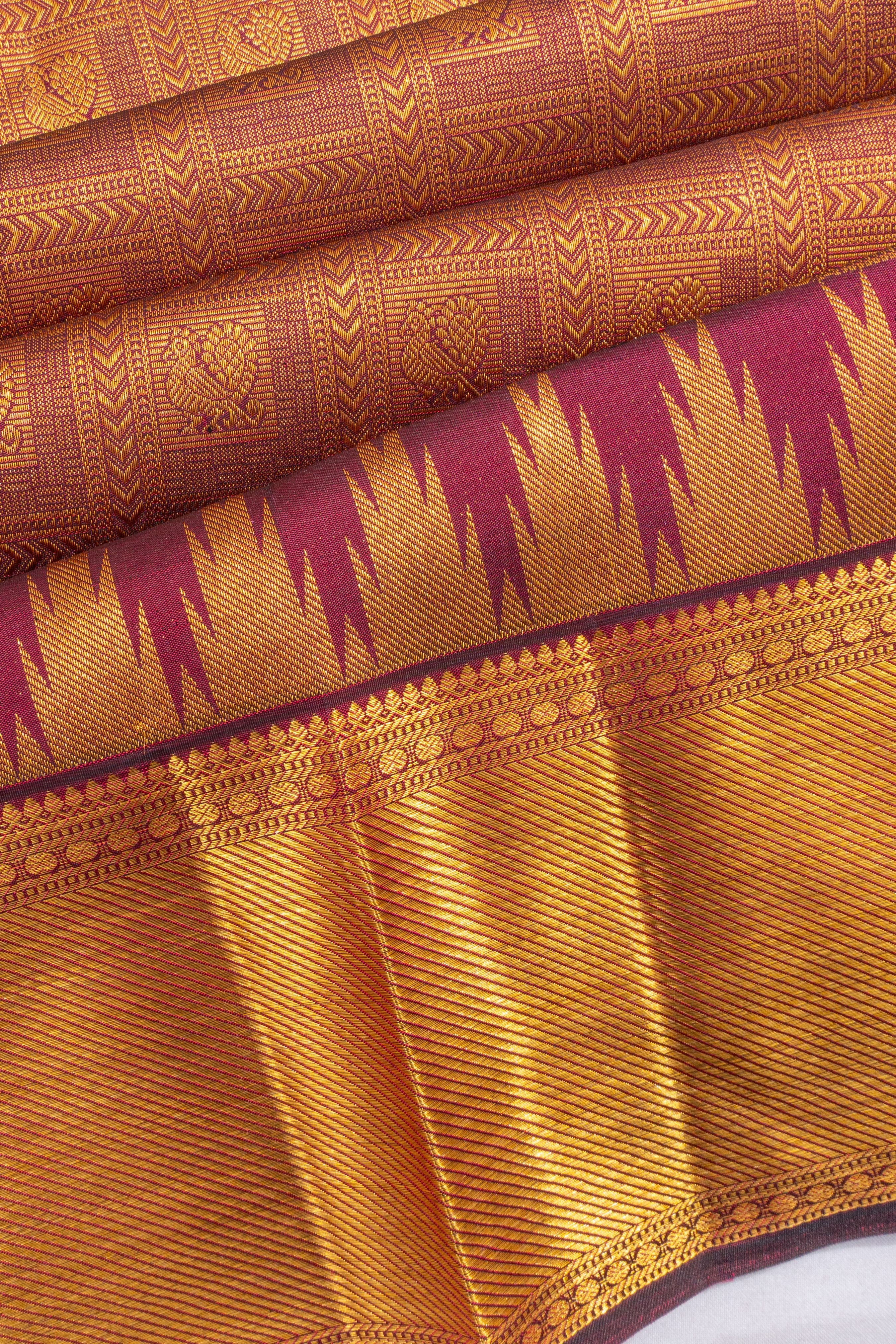 Taranga Kanchi Silk Checks And Butta Purple Saree