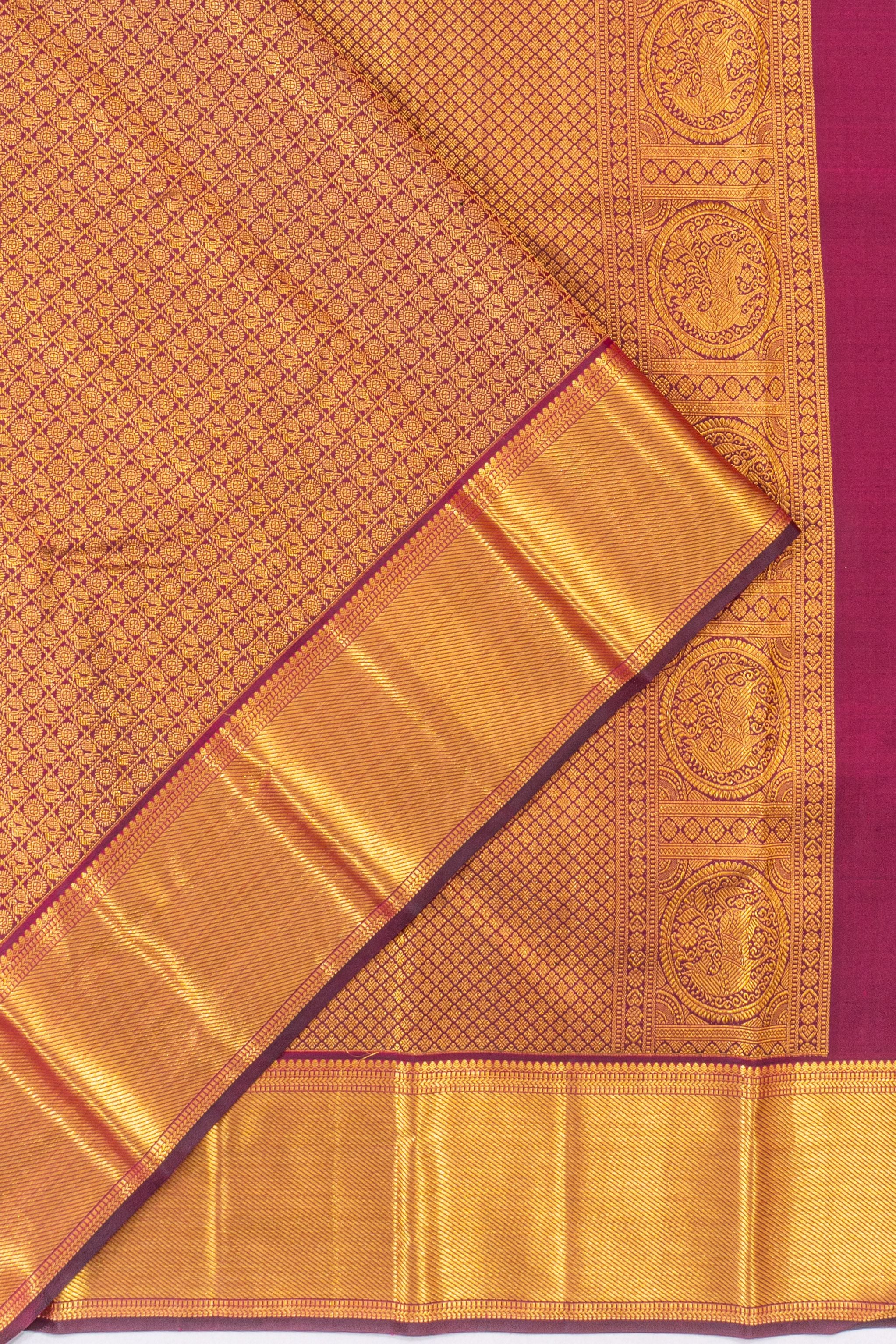 Taranga Kanchi Silk Checks And Butta Purple Saree