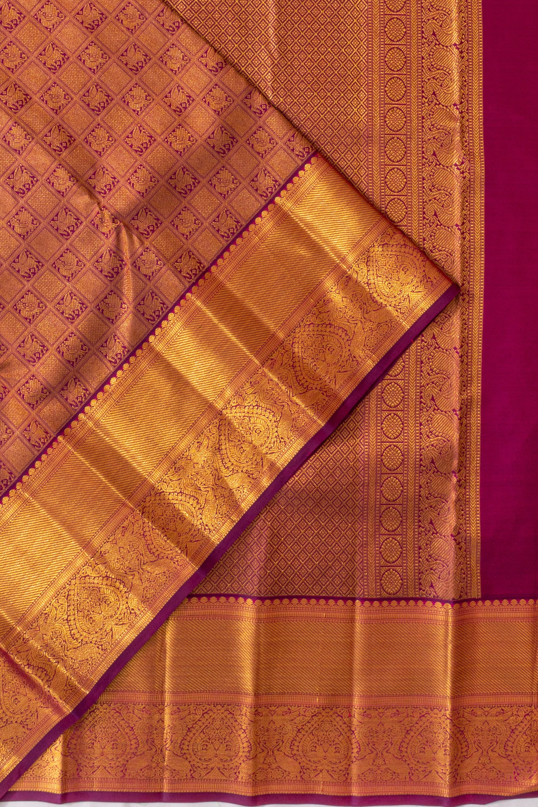 Taranga Kanchi Silk Checks And Butta Purple Saree