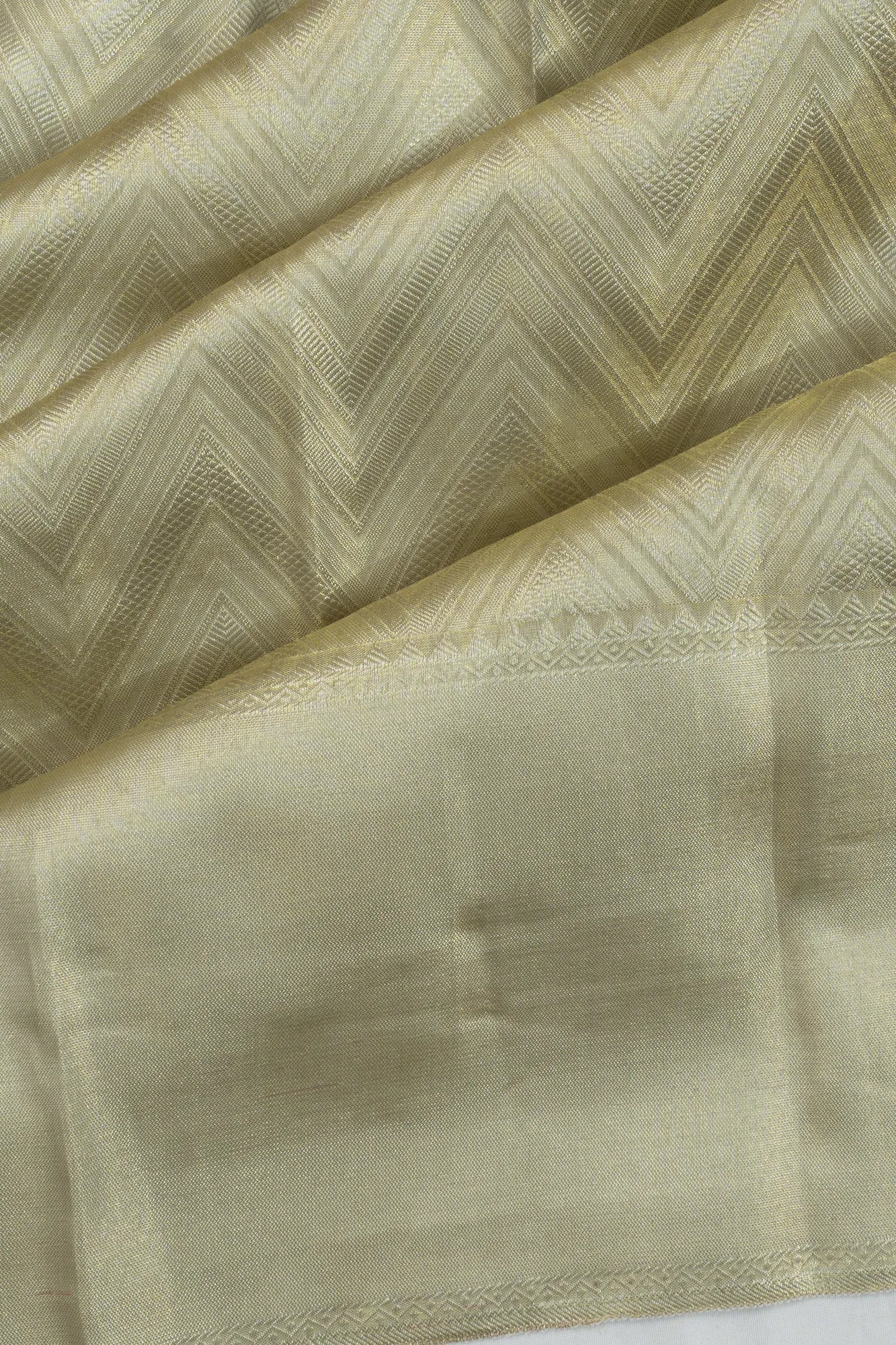 Taranga Kanchi Silk Tissue Zig Zag Lines Gold Saree