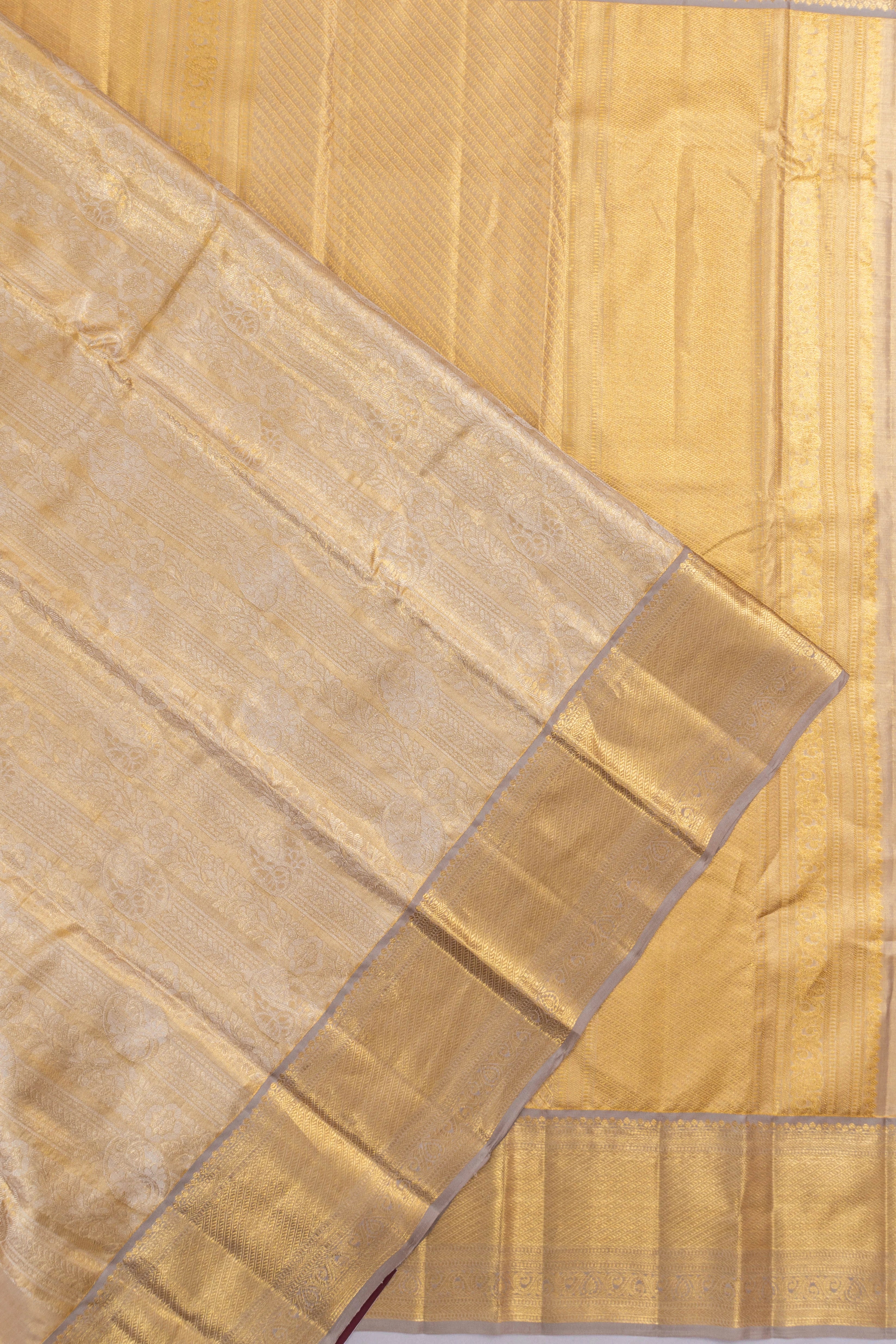 Taranga Kanchi Silk Tissue Brocade Gold Saree