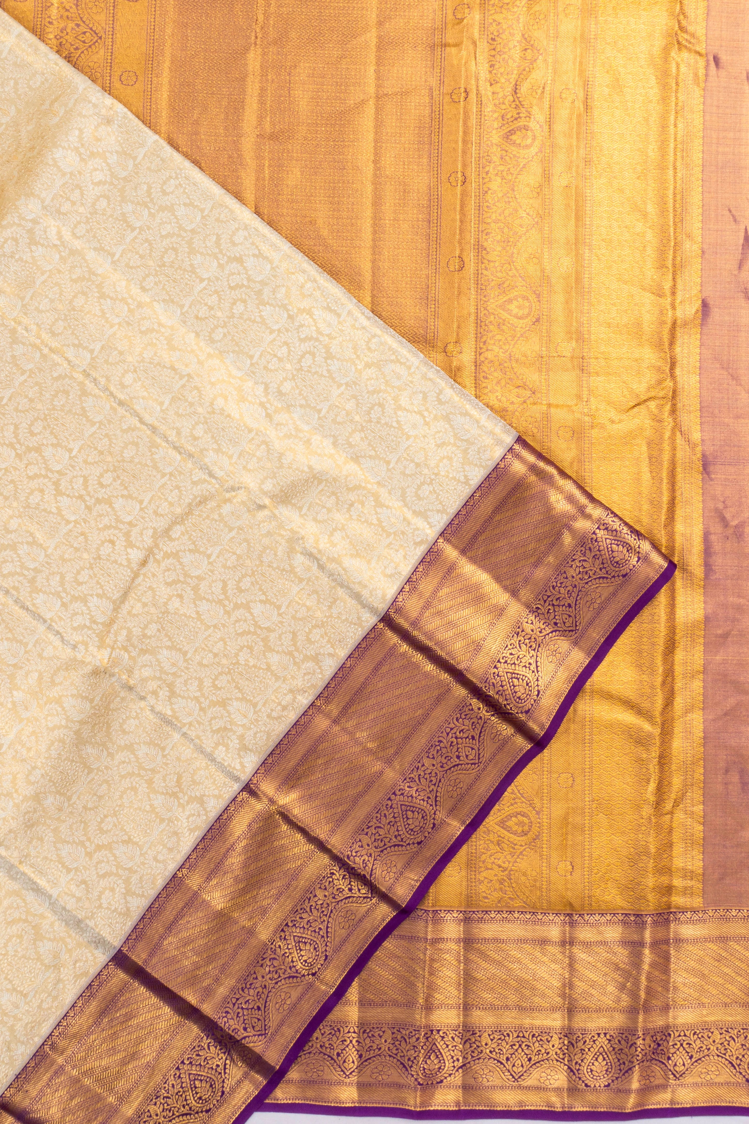 Taranga Kanchi Silk Tissue Brocade Gold Saree