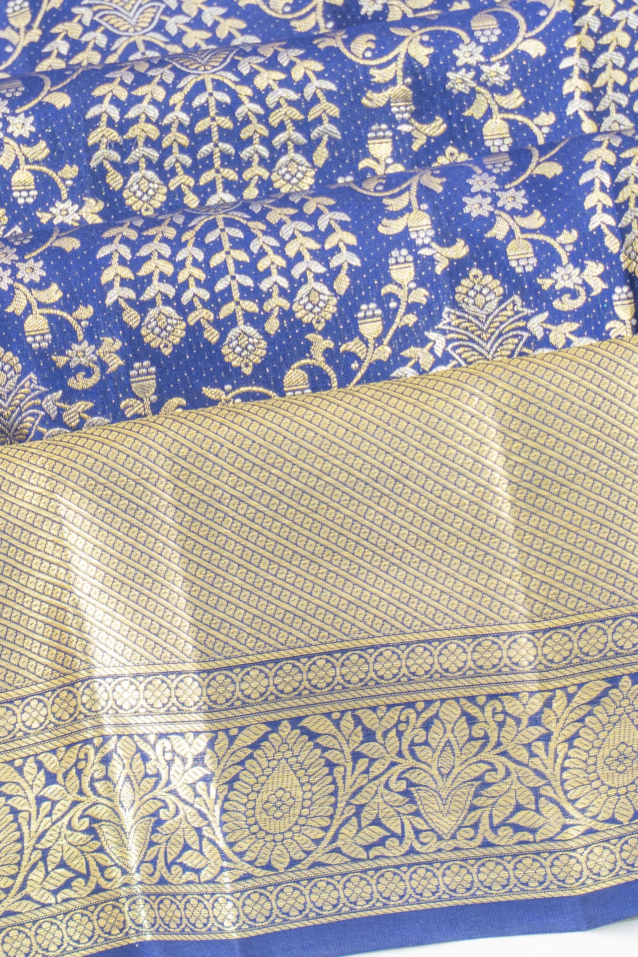 Taranga Kanchi Silk Jaal And Butta Blue Saree
