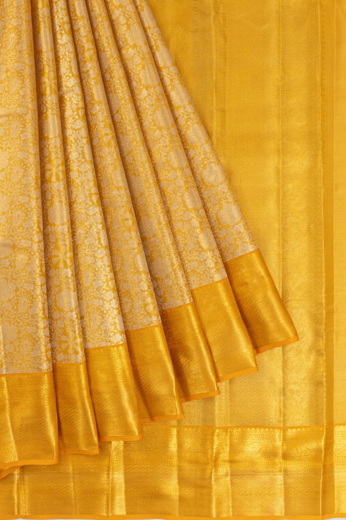 Taranga Kanchi Silk Tissue Brocade Gold Saree