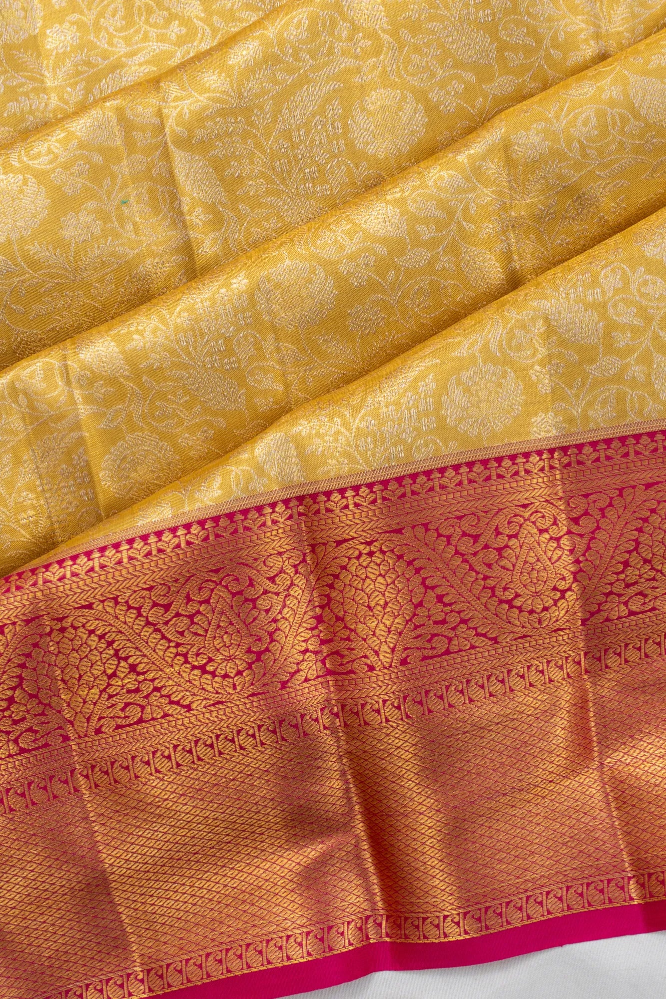 Taranga Kanchi Silk Tissue Brocade Gold Saree