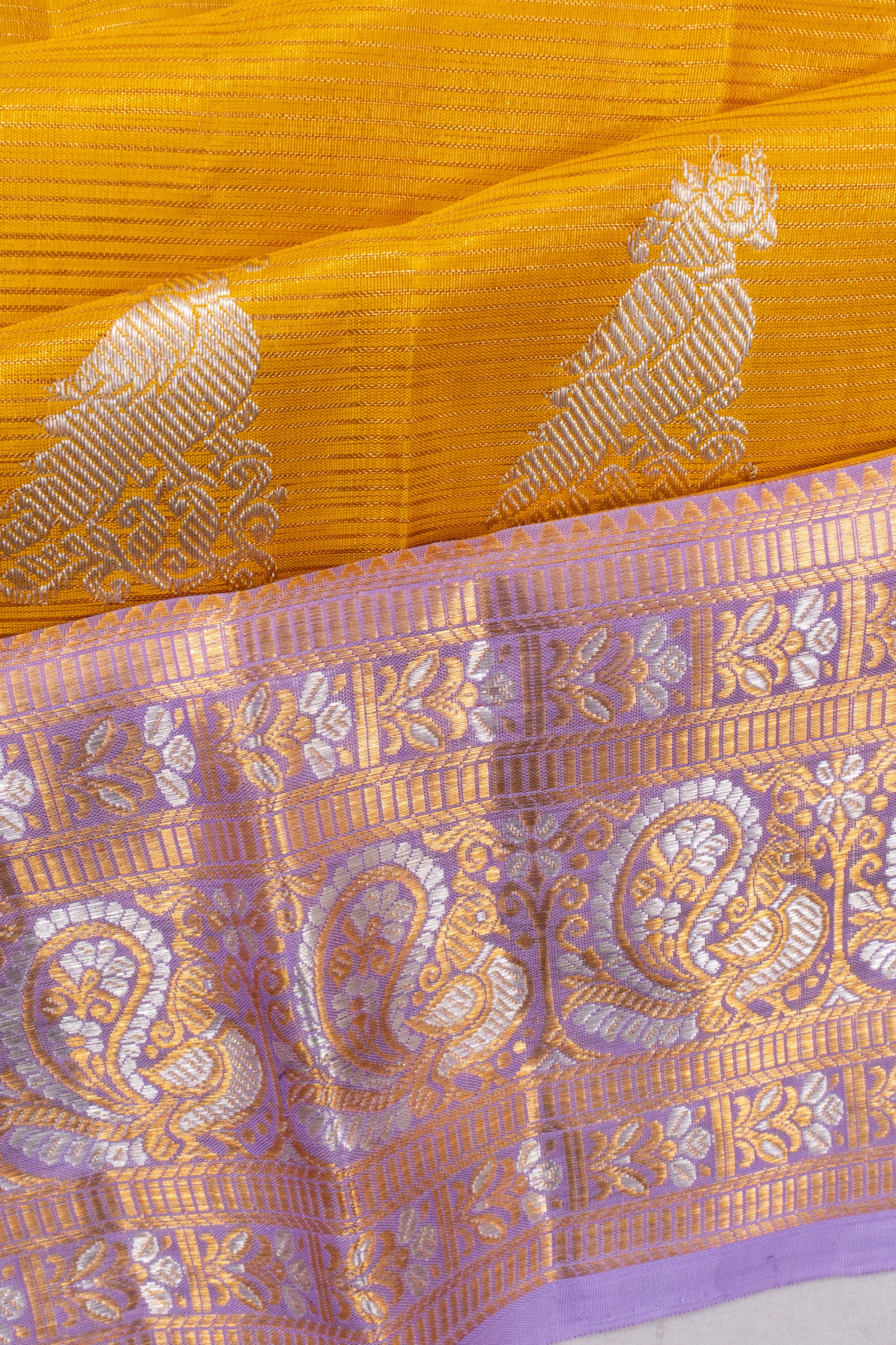 Kanchipuram Silk Oosi Lines And Butta Yellow Saree