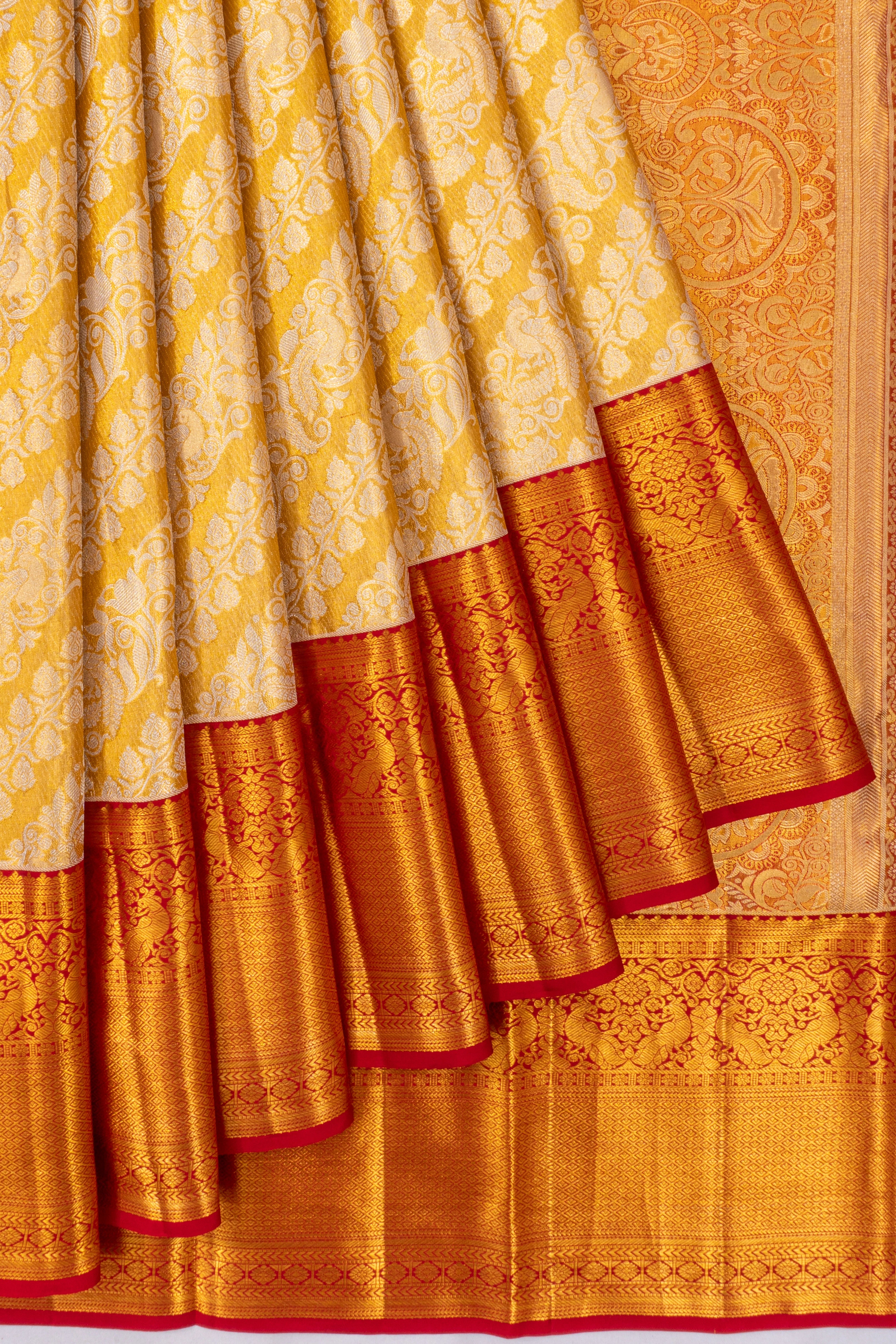 Taranga Kanchi Silk Tissue Jaal Gold Saree