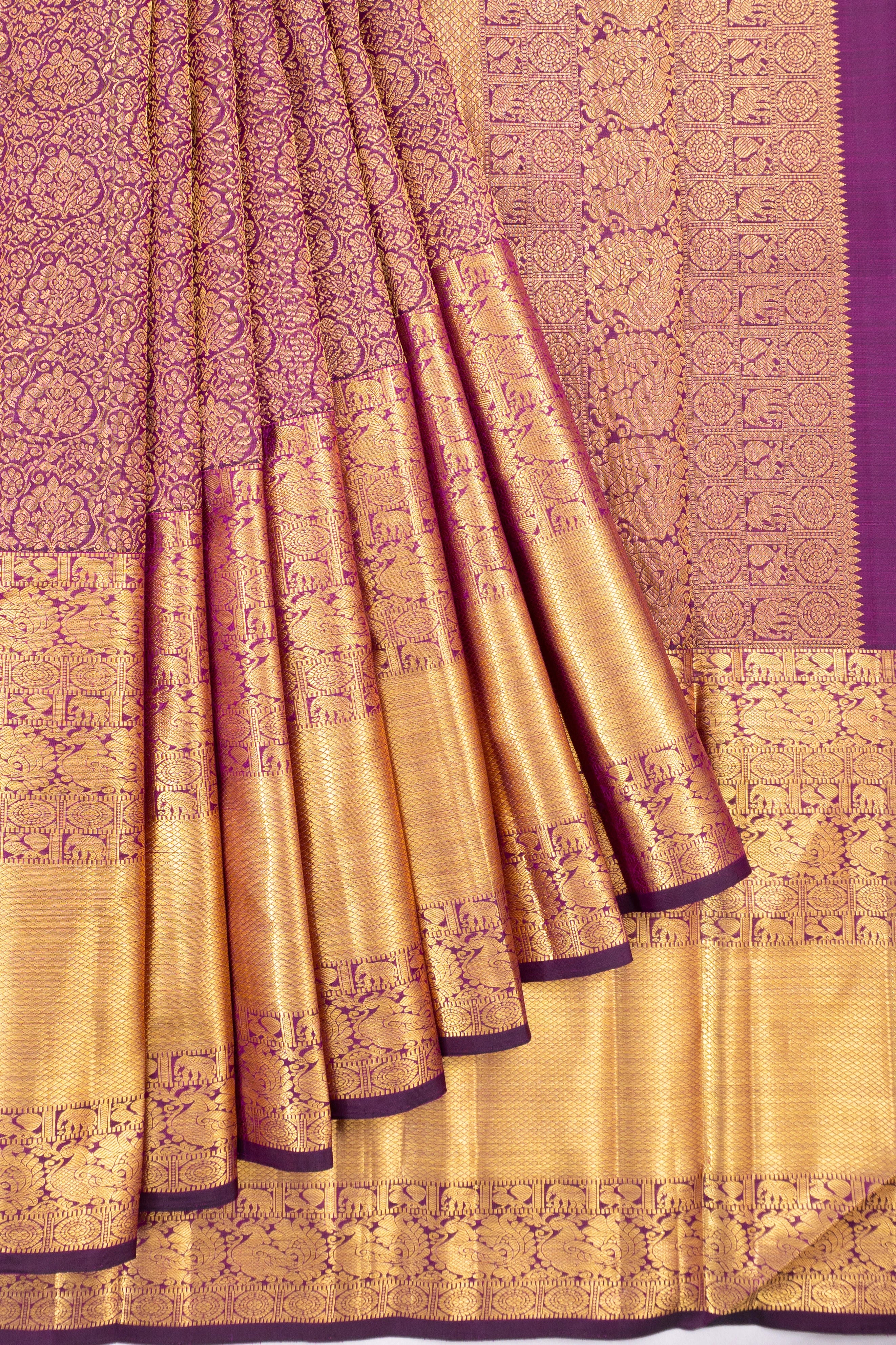 Kanchipuram Silk Jaal And Brocade Purple Saree With Very Big Border
