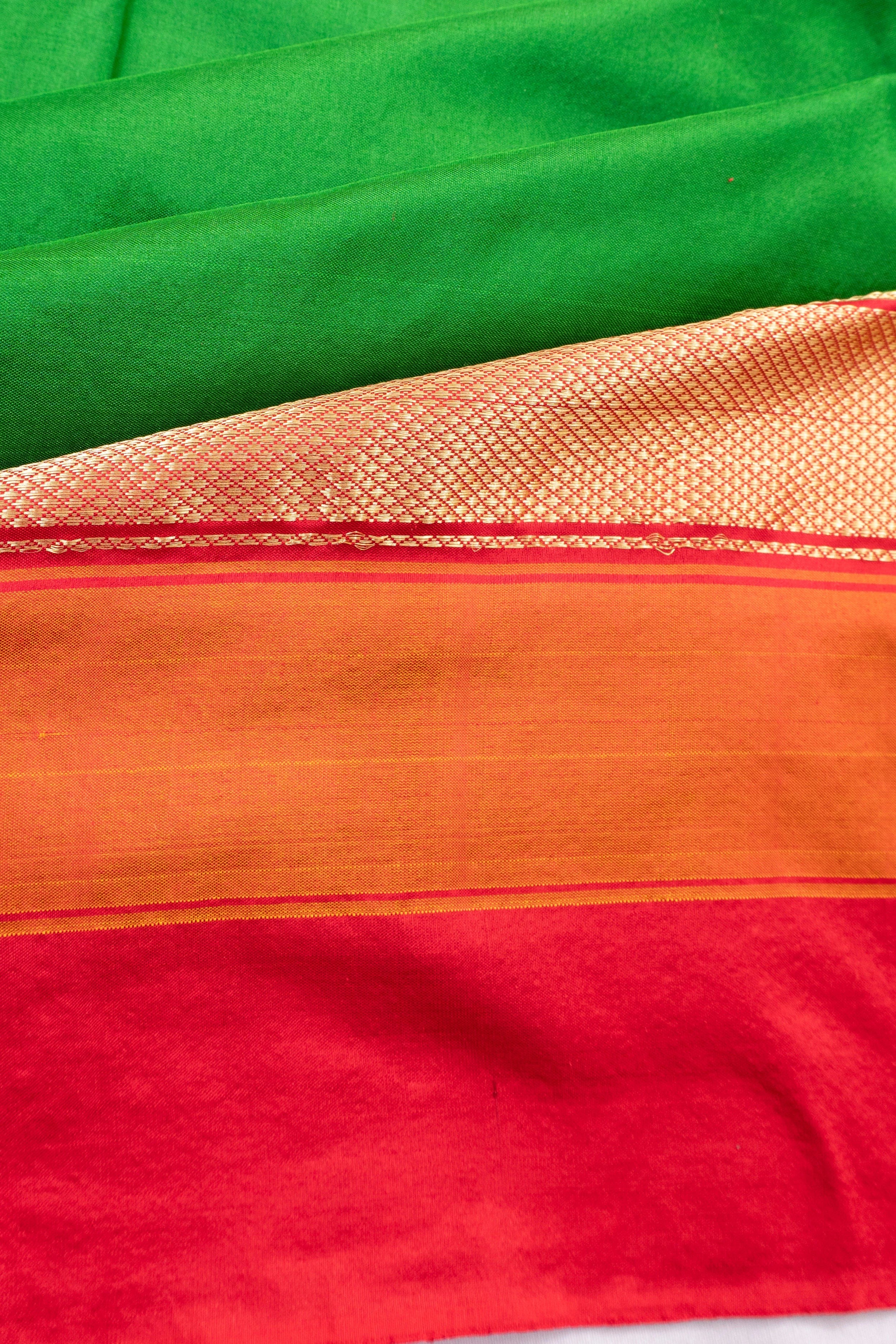 Pochampally Silk Ikat Plain Green Saree