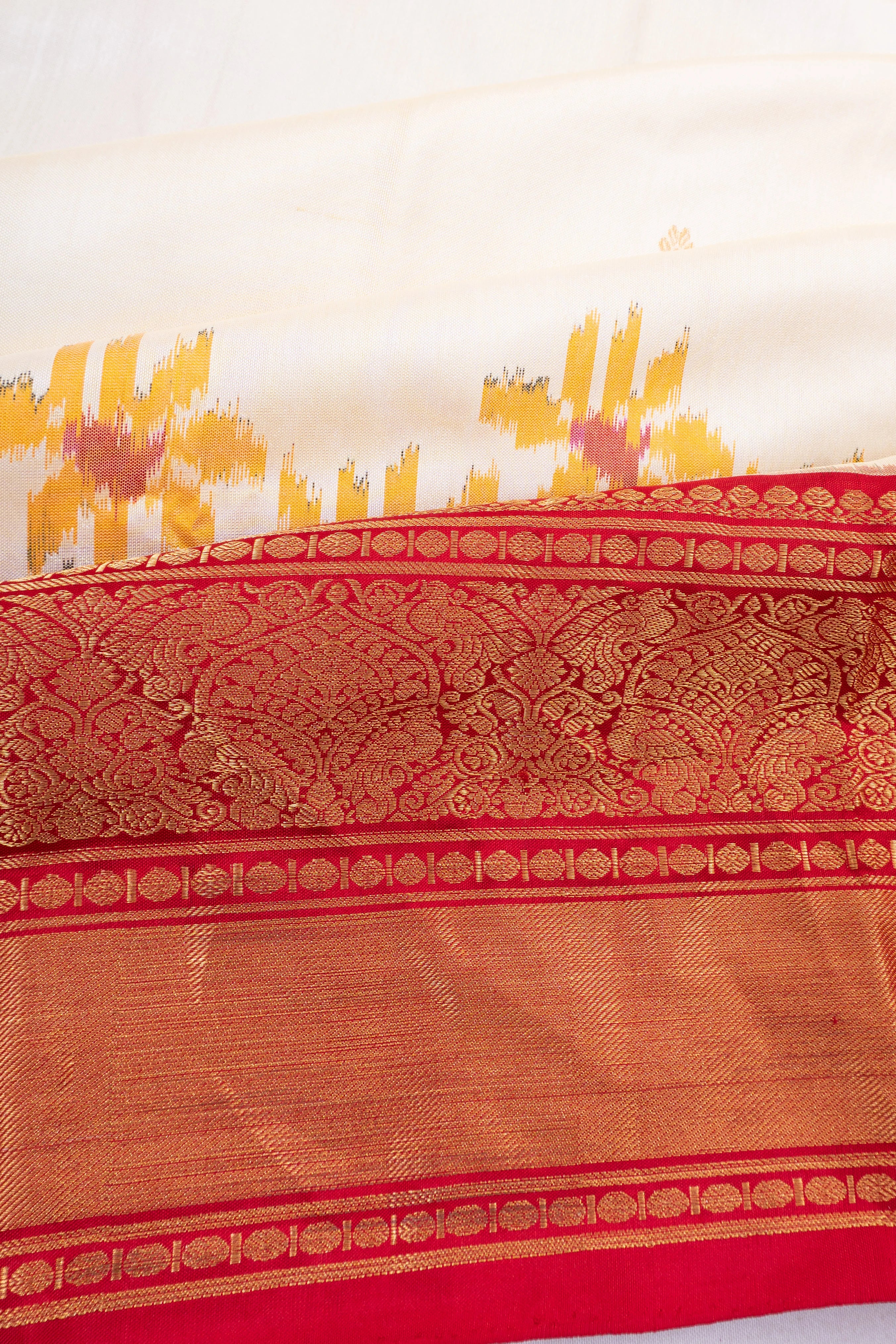 Kanchipuram Silk Ikat And Butta White Saree