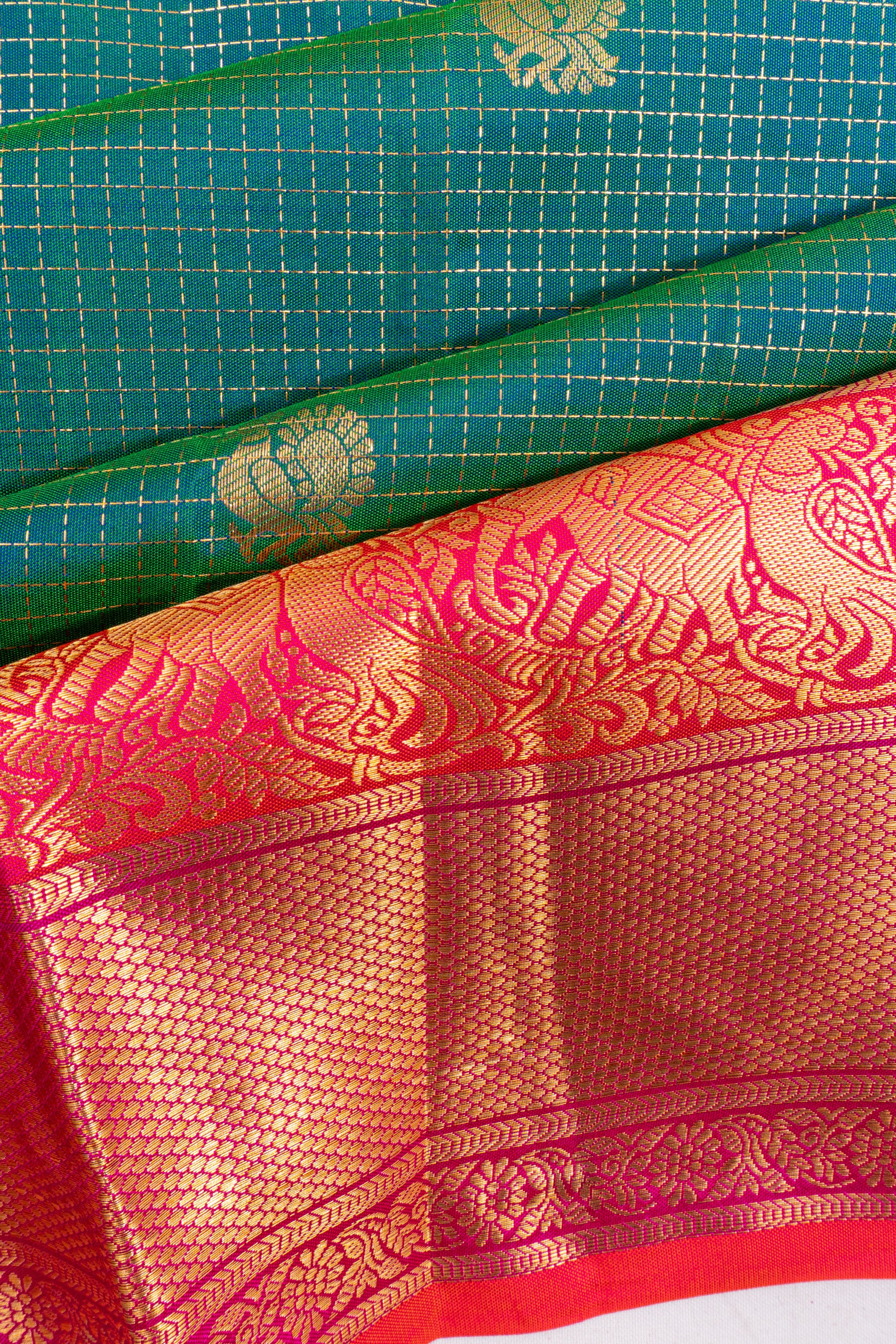 Gadwal Silk Checks And Butta Green Saree