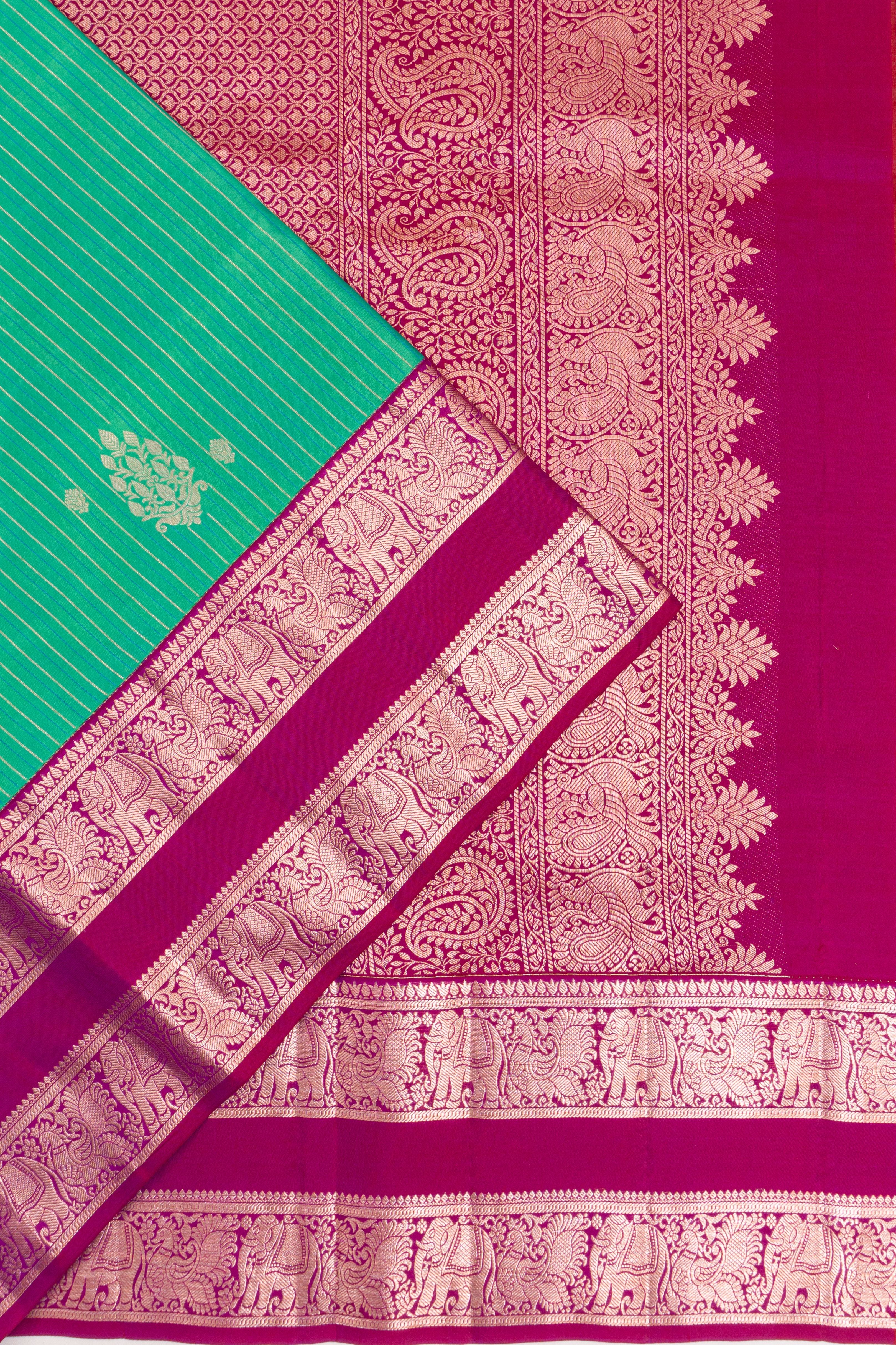 Gadwal Silk Lines And Butta Green Saree With Rettai Pettu Border