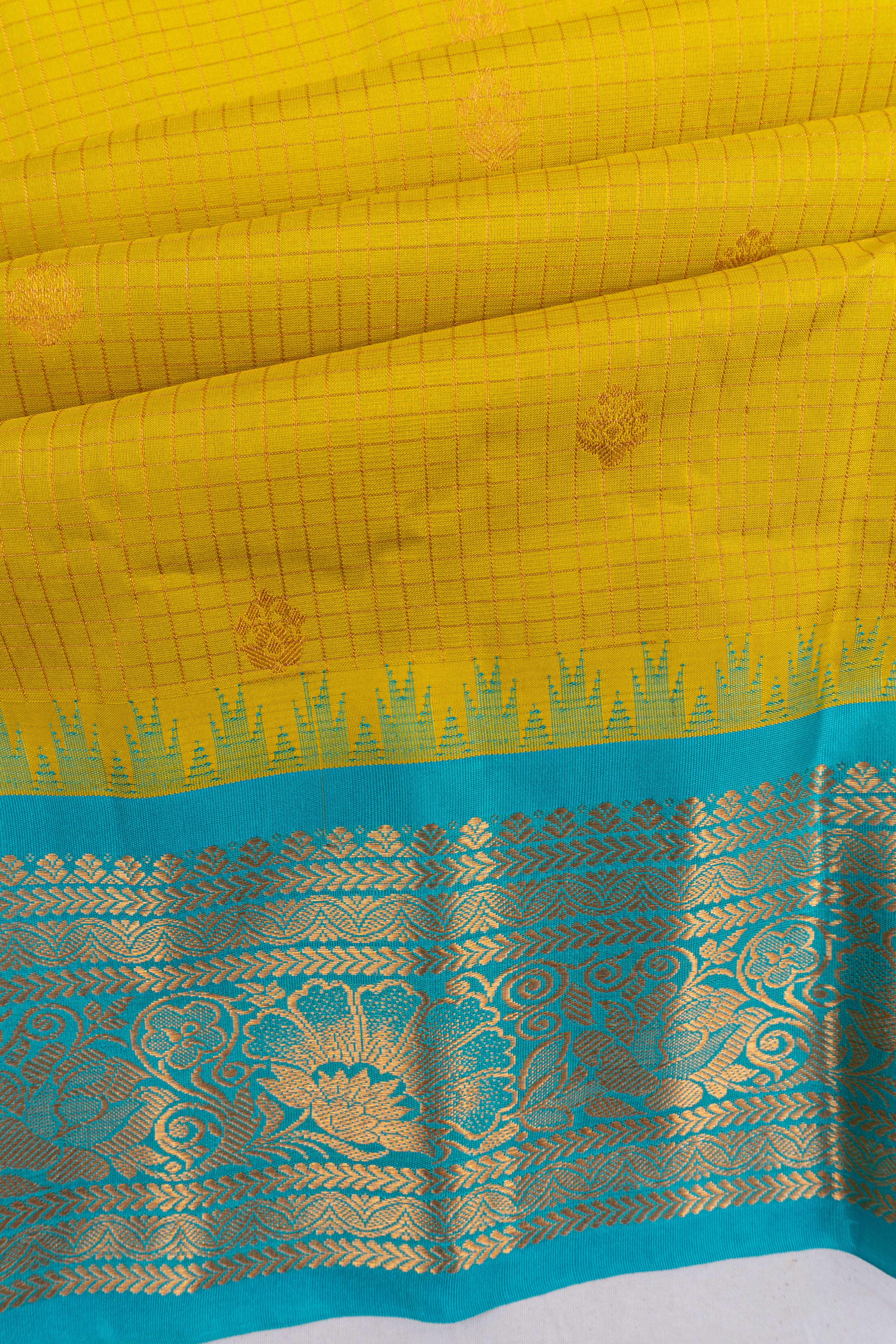 Gadwal Silk Checks And Butta Green Saree