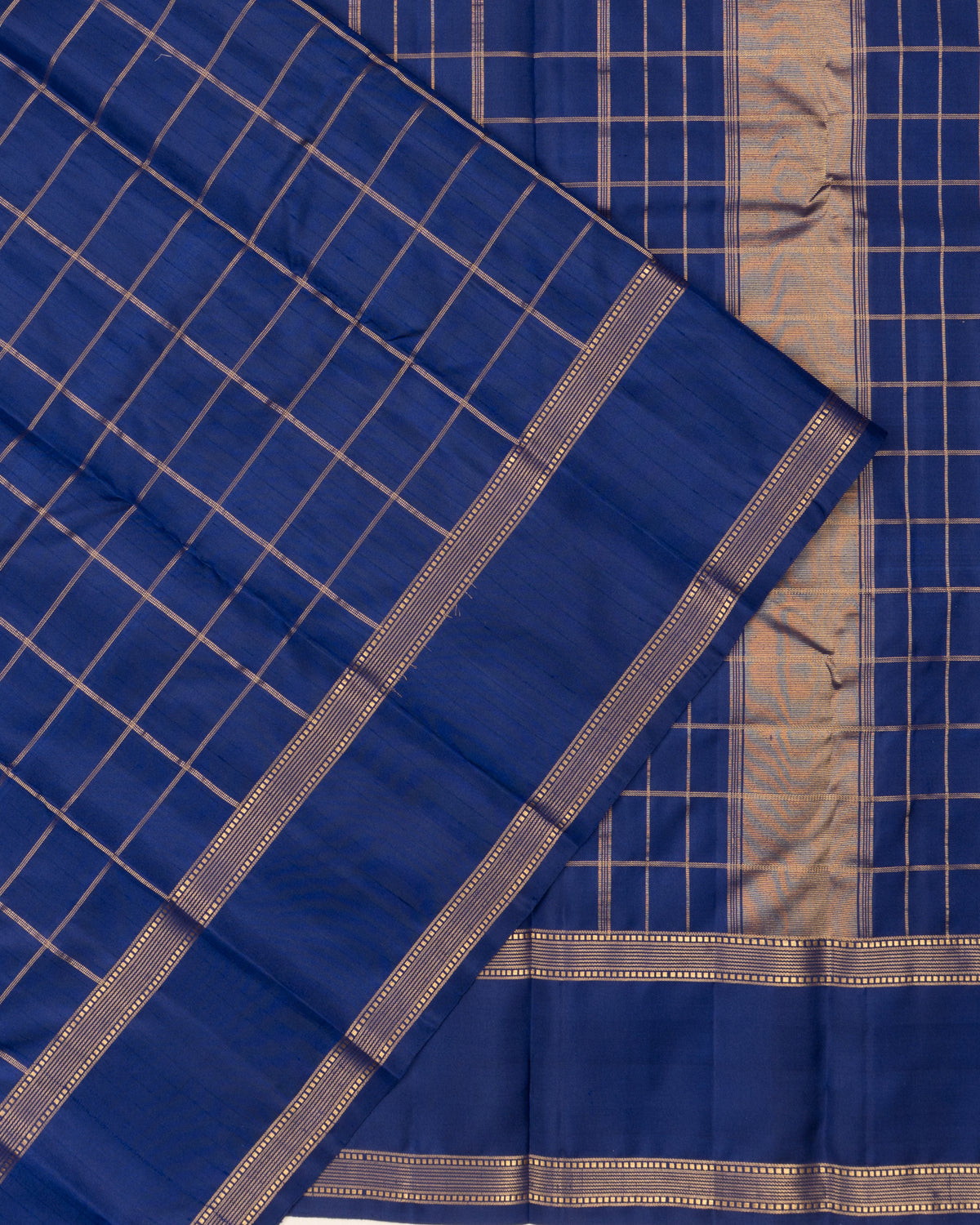 Taranga Kanchi Silk Checks Blue Saree With Rettai Pettu Border