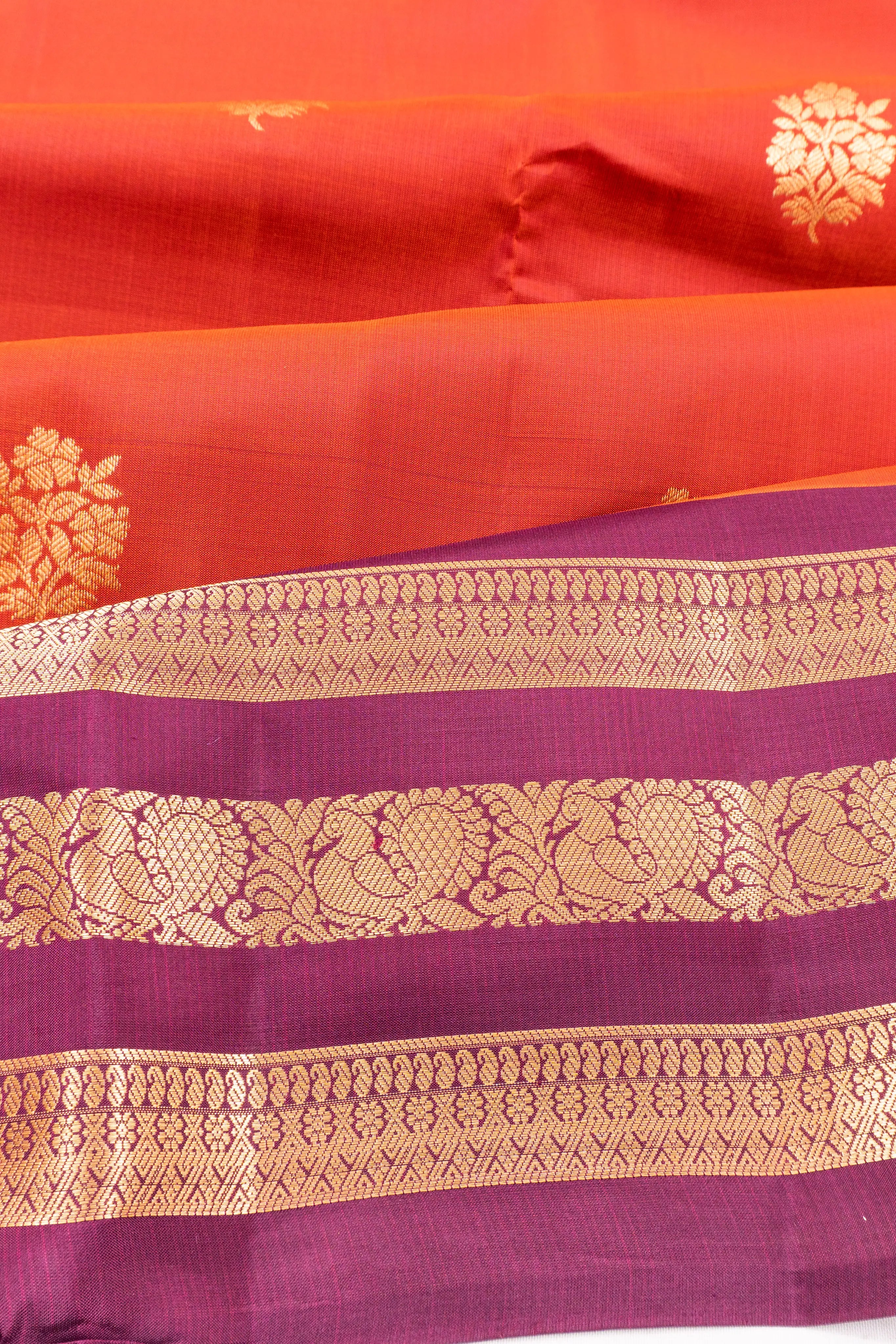 Taranga Kanchi Silk Butta Rust Orange Saree