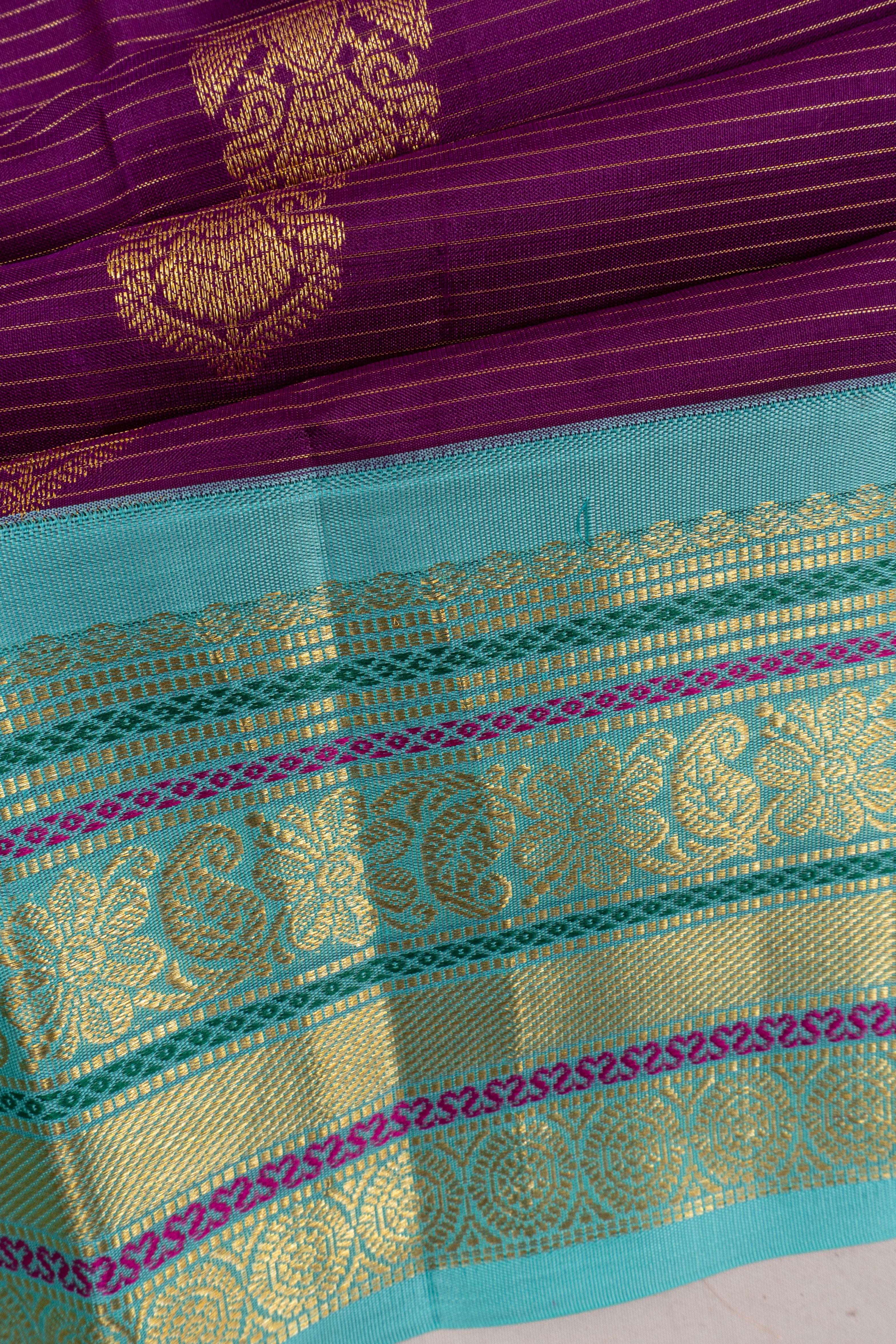 Taranga Kanchi Silk Lines And Butta Purple Saree