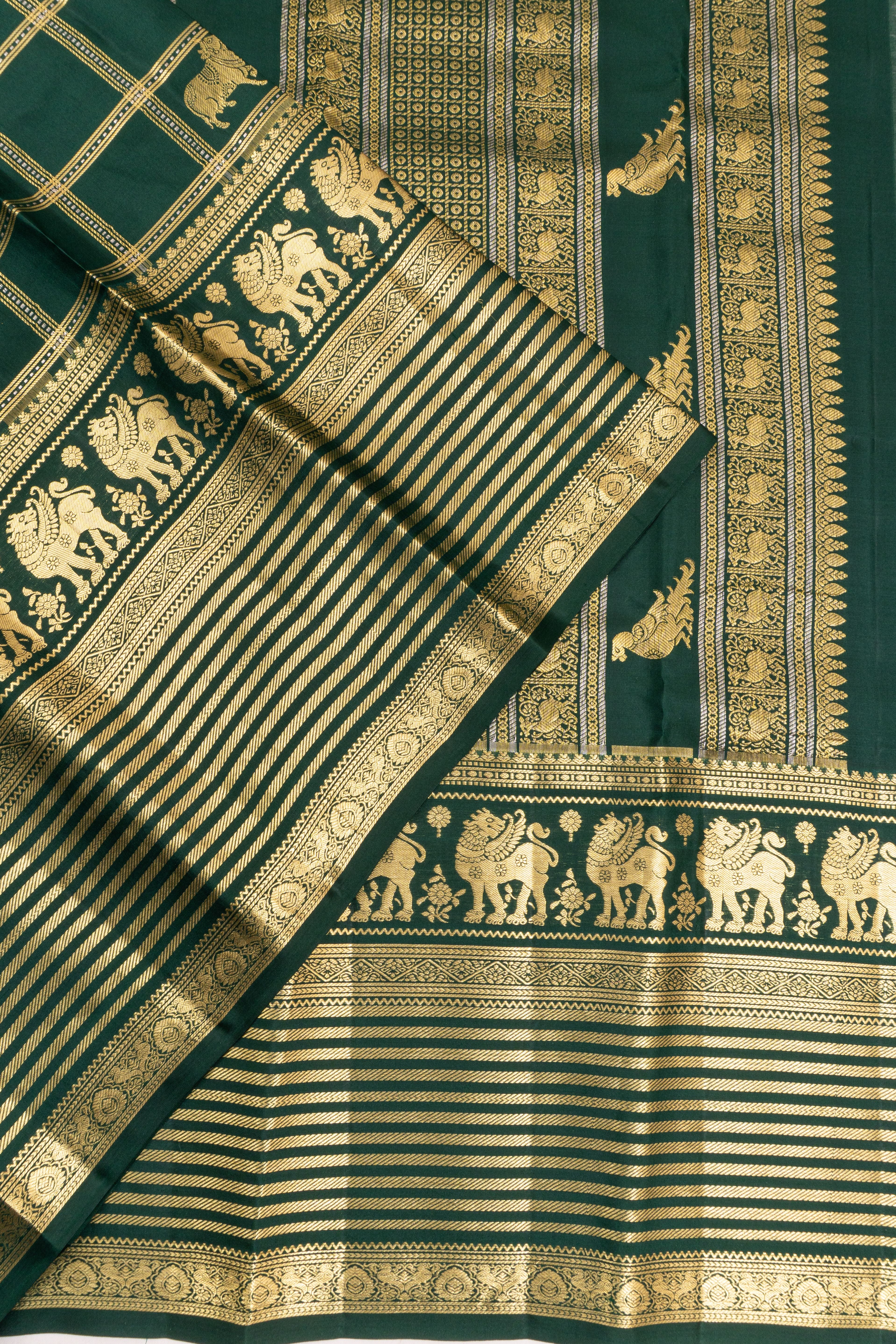 Taranga Kanchi Silk Checks And Pichwai Butta Bottle Green Saree