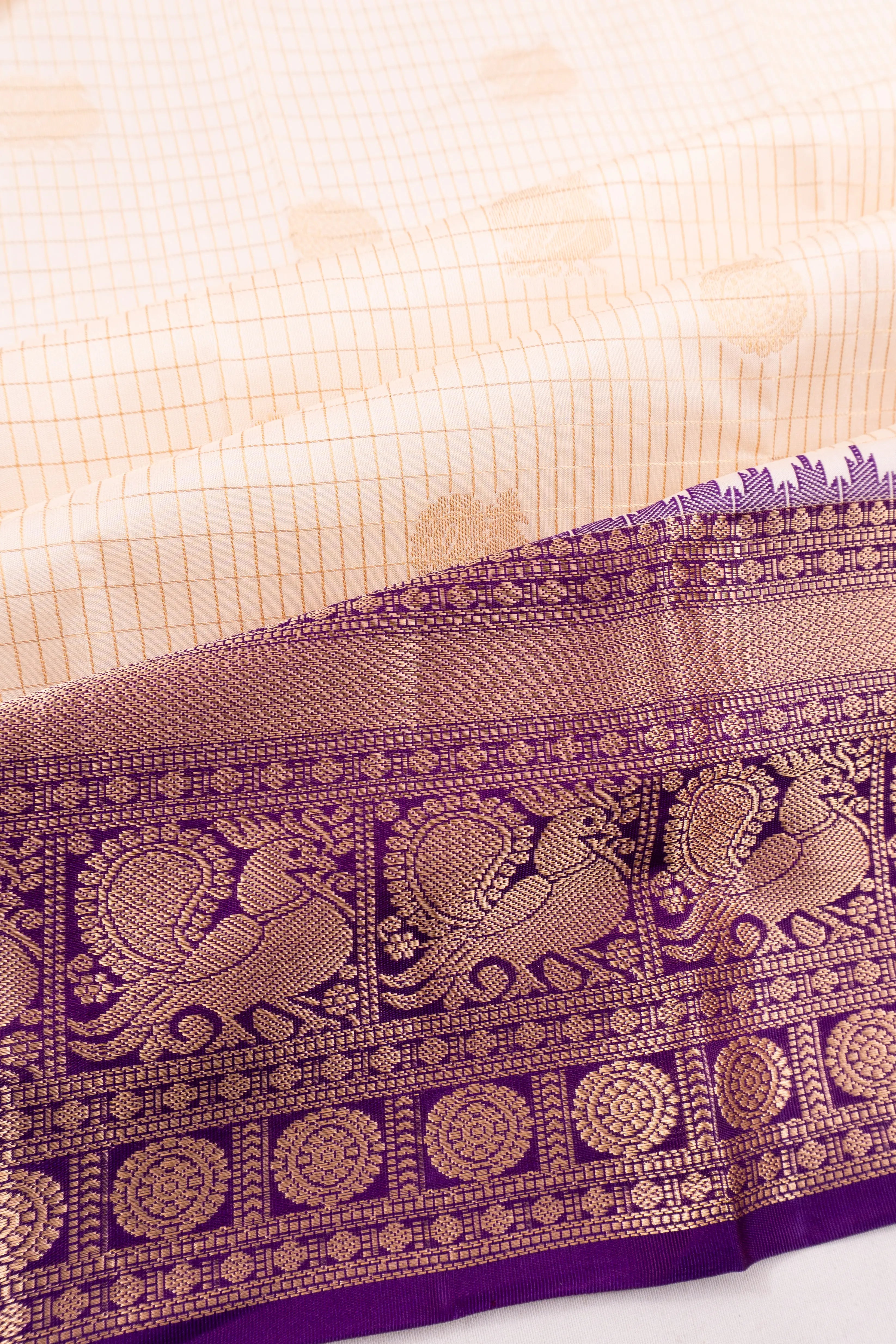 Taranga Kanchi Silk Checks And Butta Cream Saree