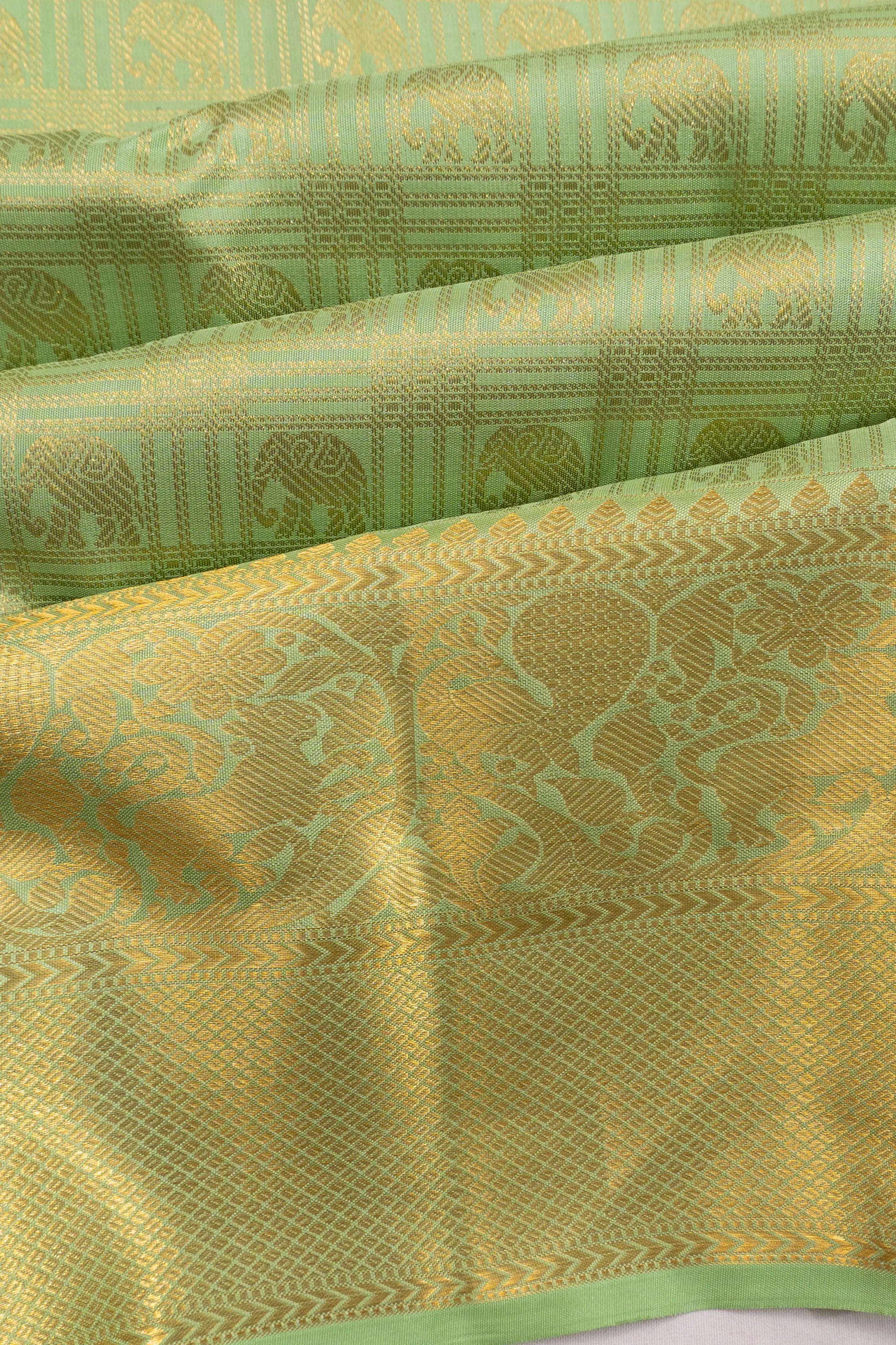 Taranga Kanchi Silk Checks And Butta Pastel Green Saree