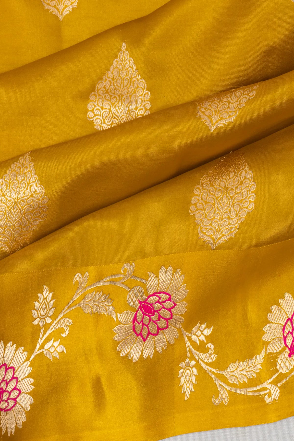Vaanya Banaras Silk Butta Mehendi Green Saree