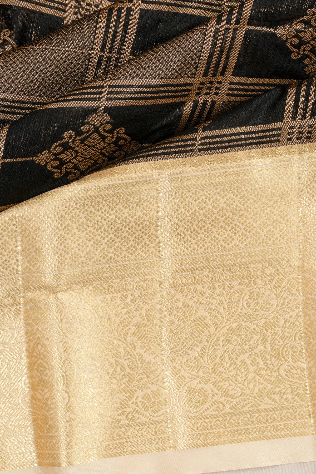 Taranga Kanchi Silk Checks And Butta Black Saree