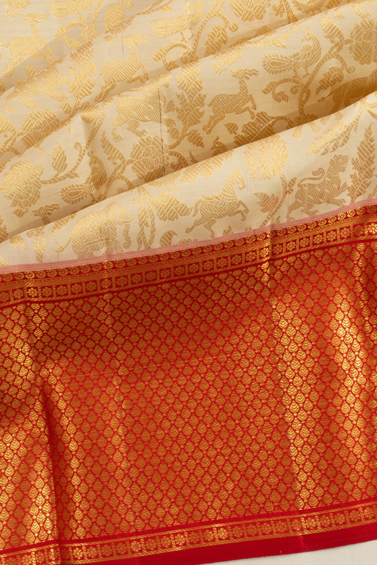 Taranga Kanchi Silk Jaal Cream Saree