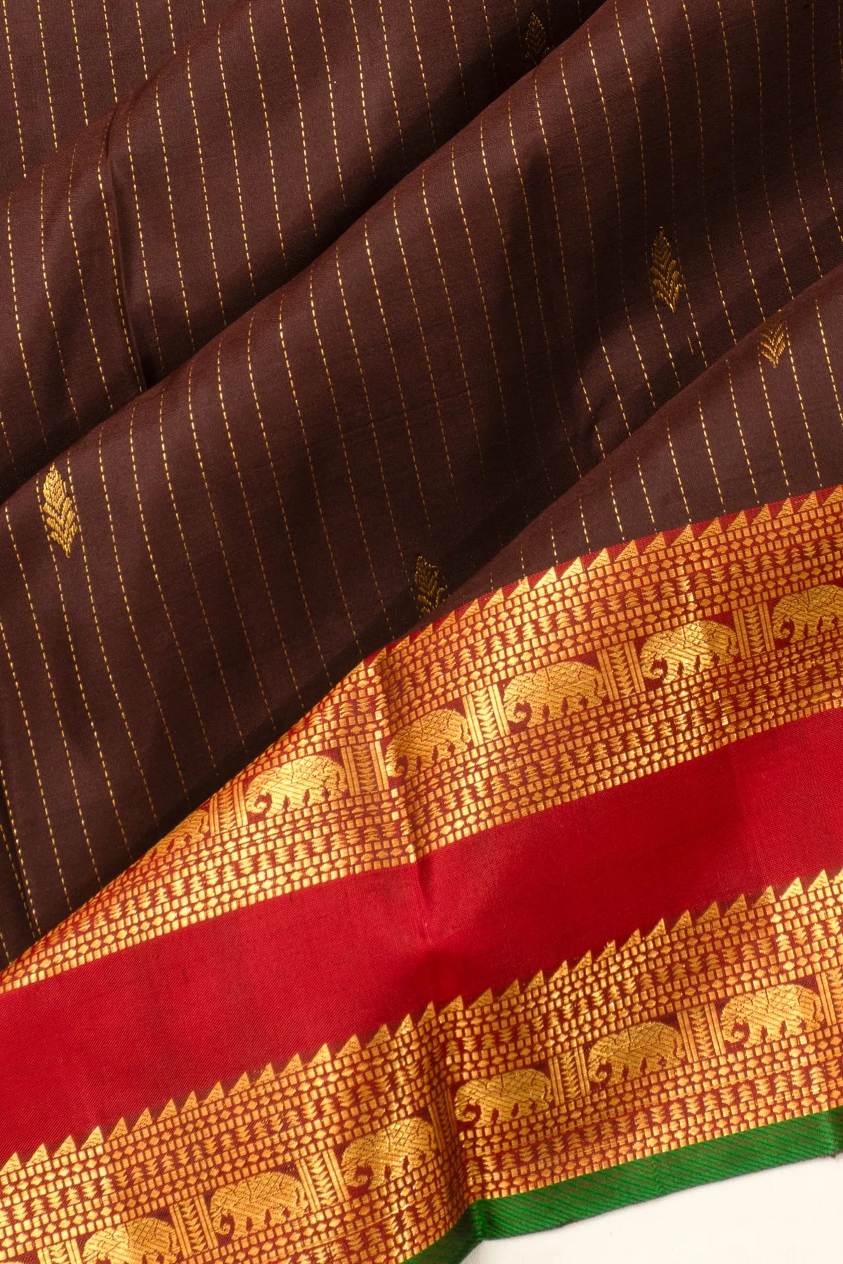 Taranga Kanchi Silk Lines And Butta Dark Brown Saree With Rettai Pettu Border