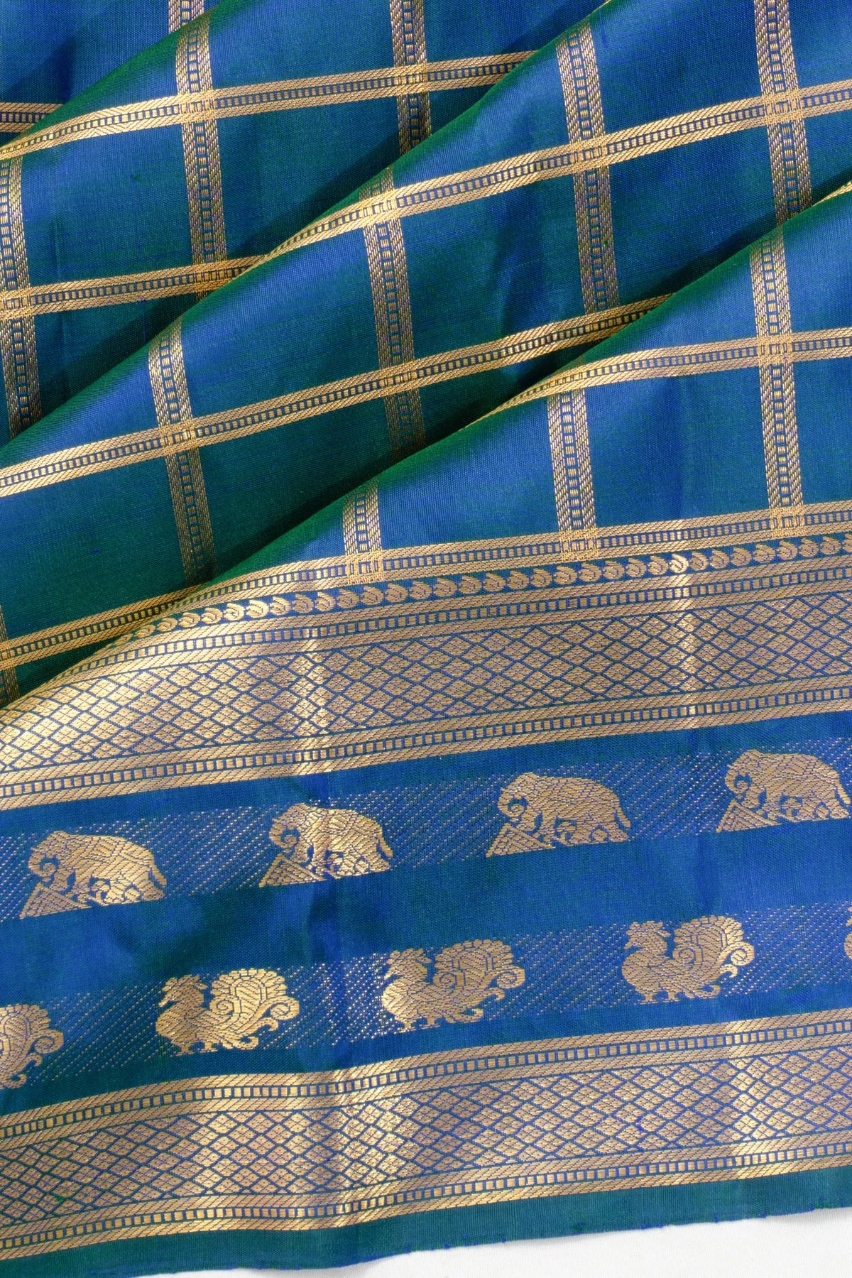 Taranga Kanchi Silk Checks Dual Tone Blue And Green Saree