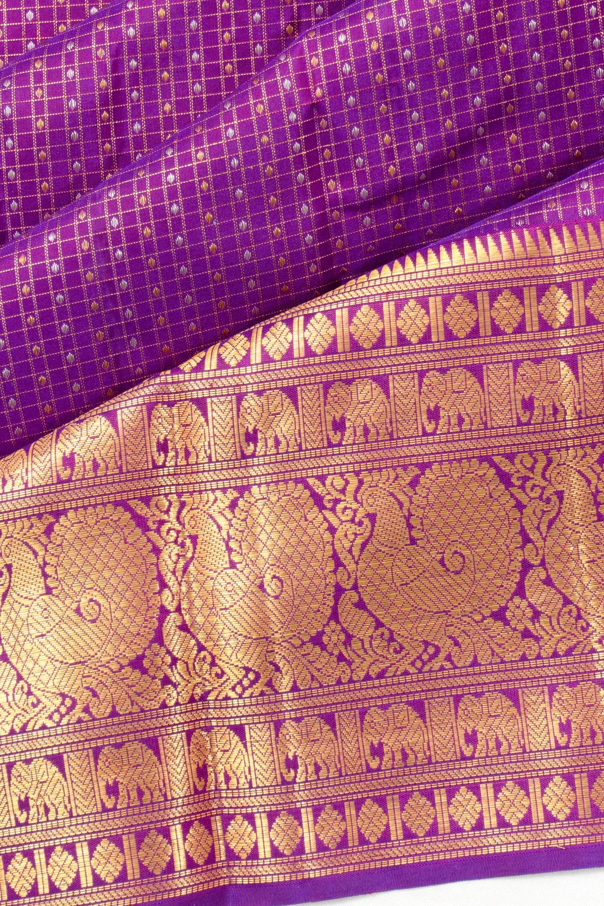Taranga Kanchi Silk Checks And Butta Purple Saree