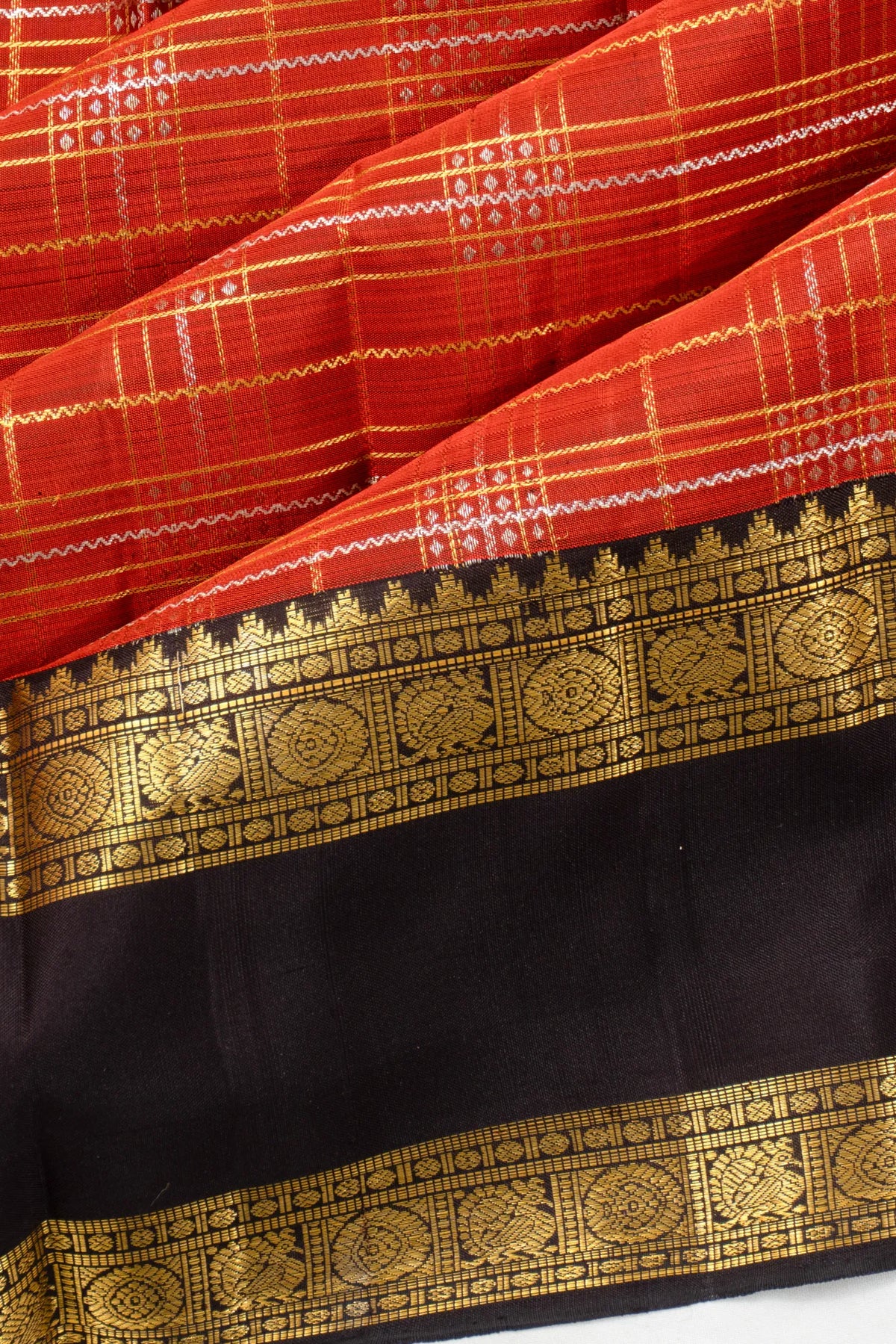 Taranga Kanchi Silk Checks Rust Orange Saree With Rettai Pettu Border