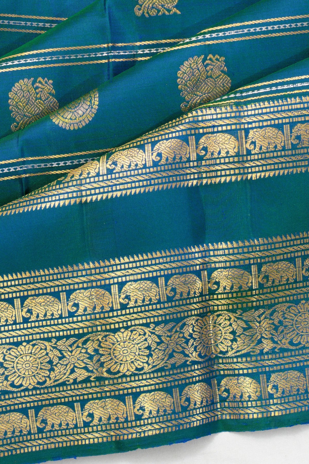Taranga Kanchi Silk Lines And Butta Dual Tone Blue And Green Saree