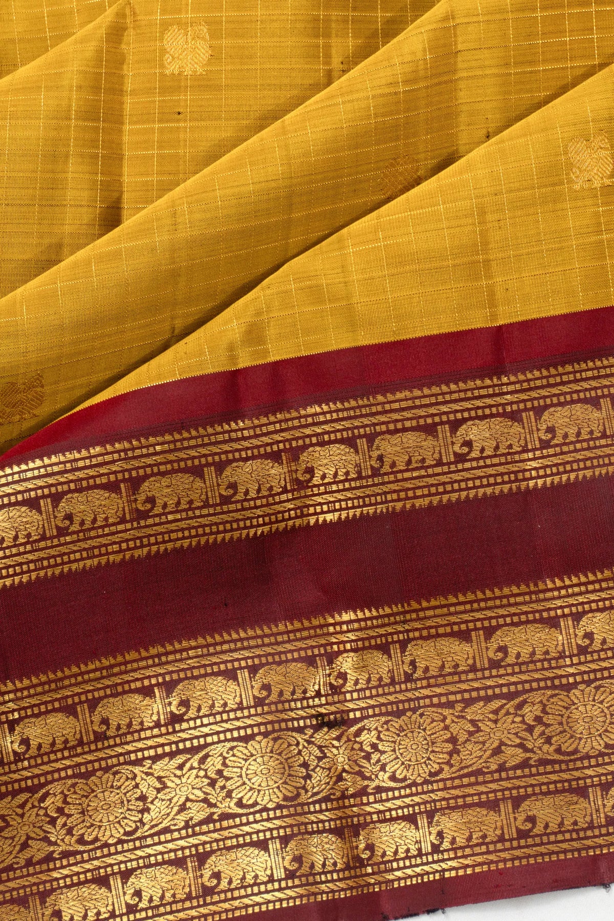 Taranga Kanchi Silk Checks And Butta Yellow Saree