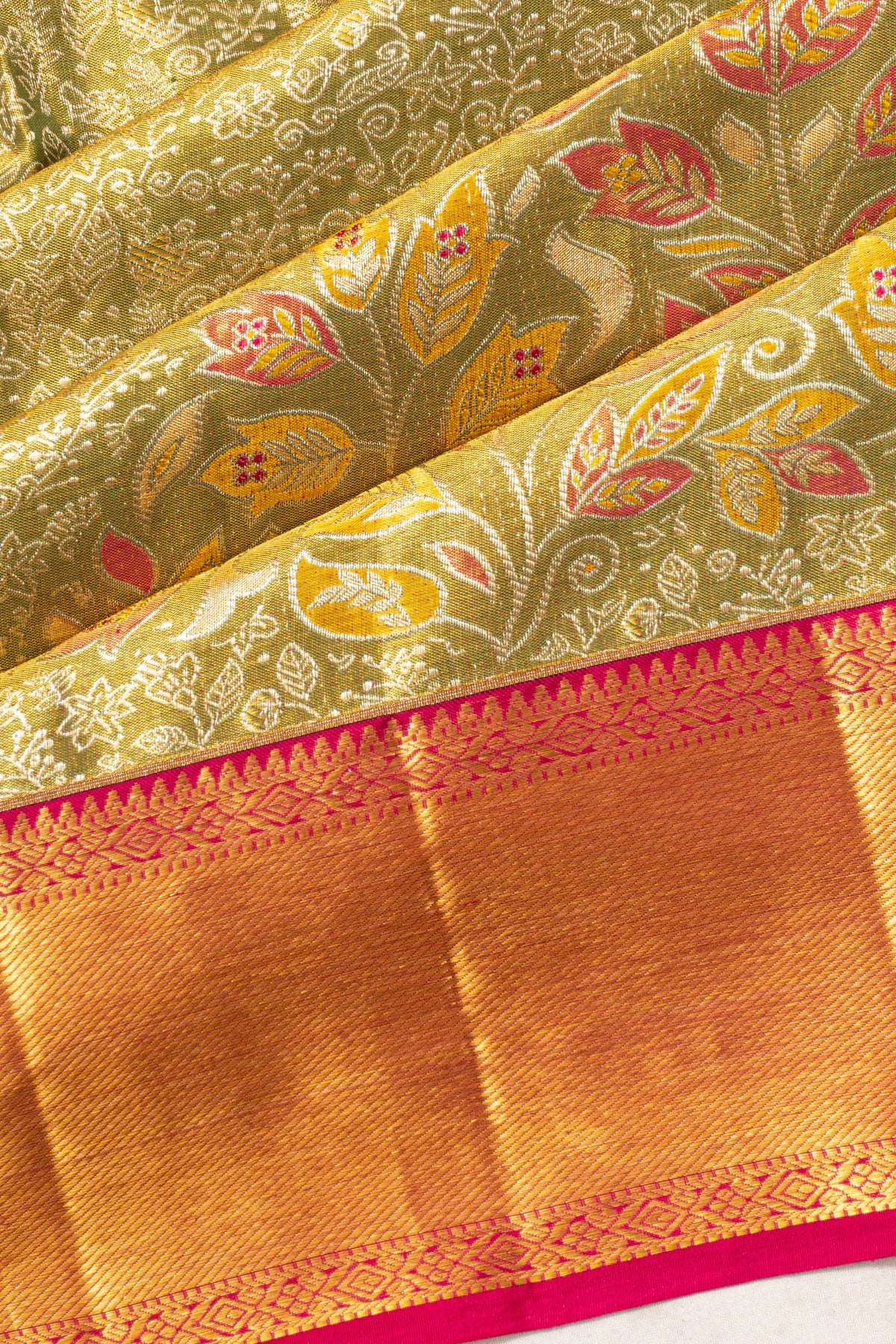 Taranga Kanchi Silk Tissue Brocade Green Saree