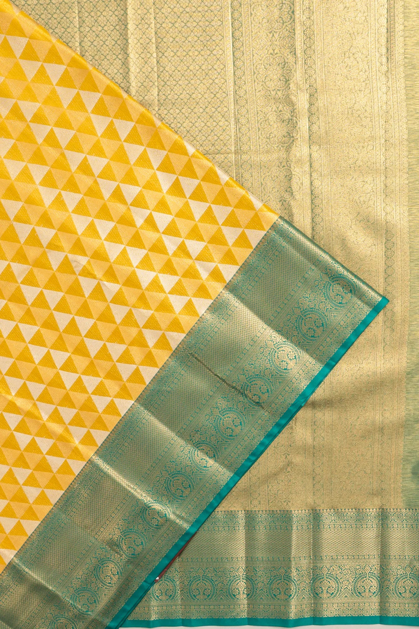 Taranga Kanchi Silk Tissue Geometrical Brocade Gold Saree