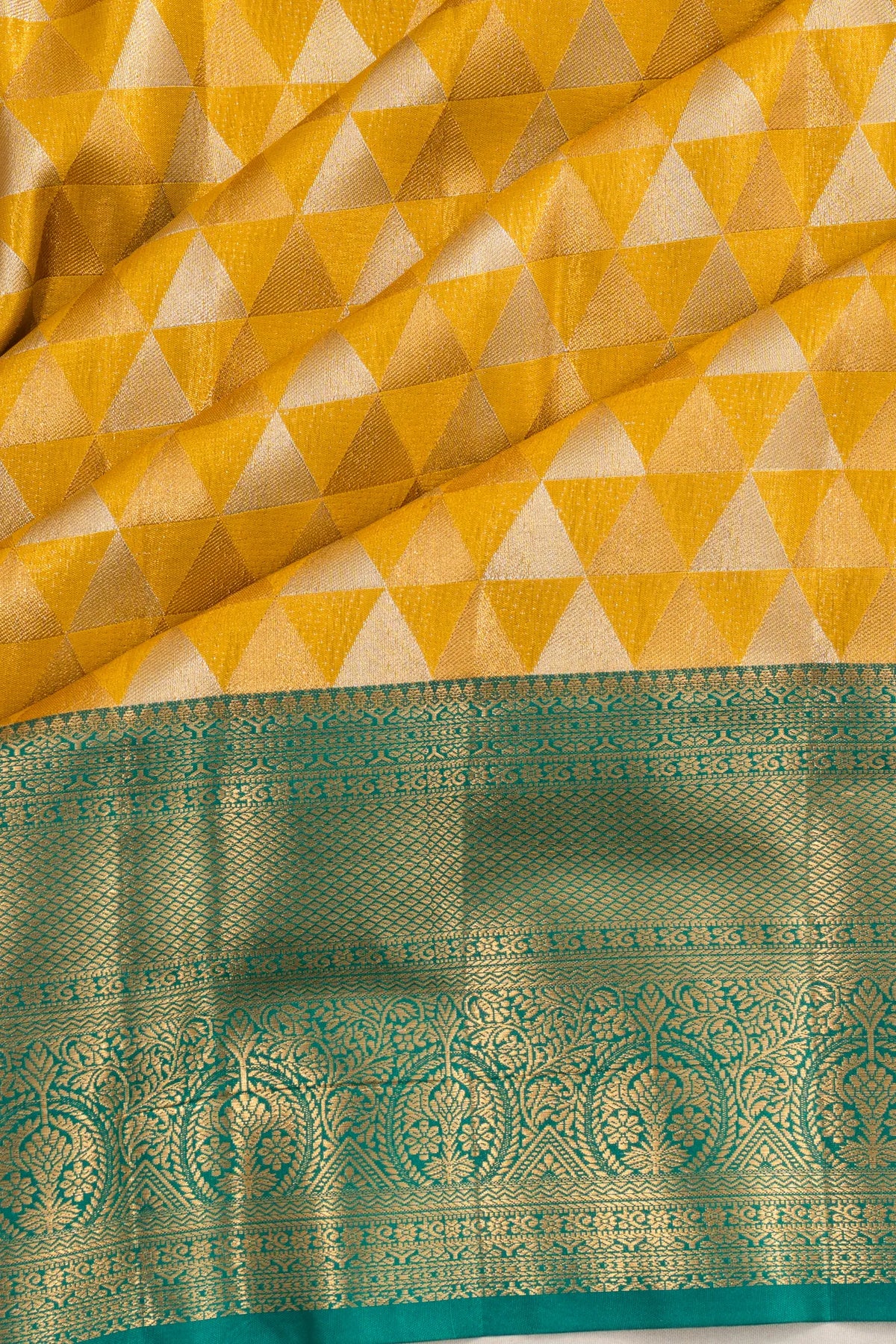 Taranga Kanchi Silk Tissue Geometrical Brocade Gold Saree