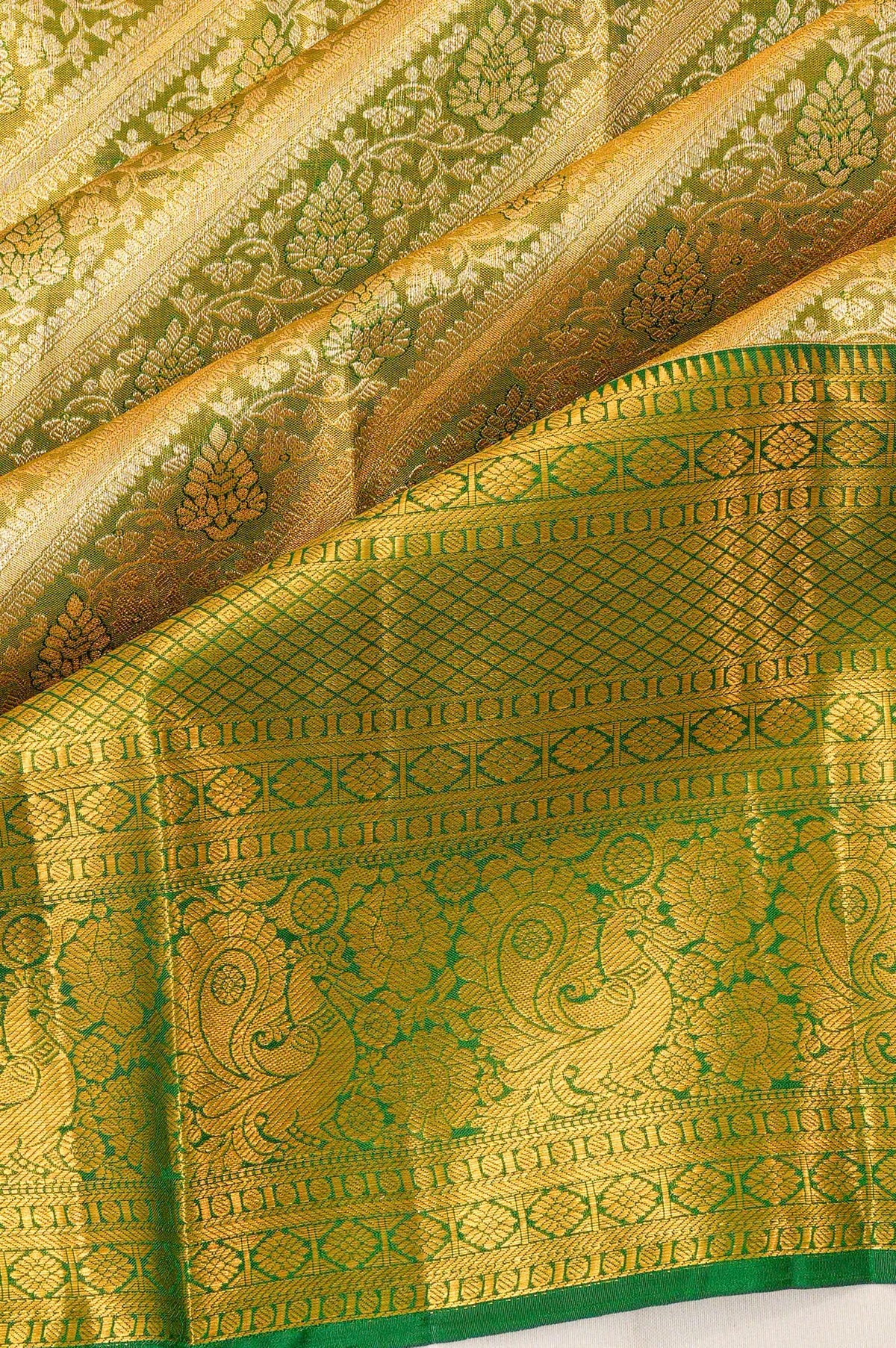 Taranga Kanchi Silk Tissue Jaal Green Saree