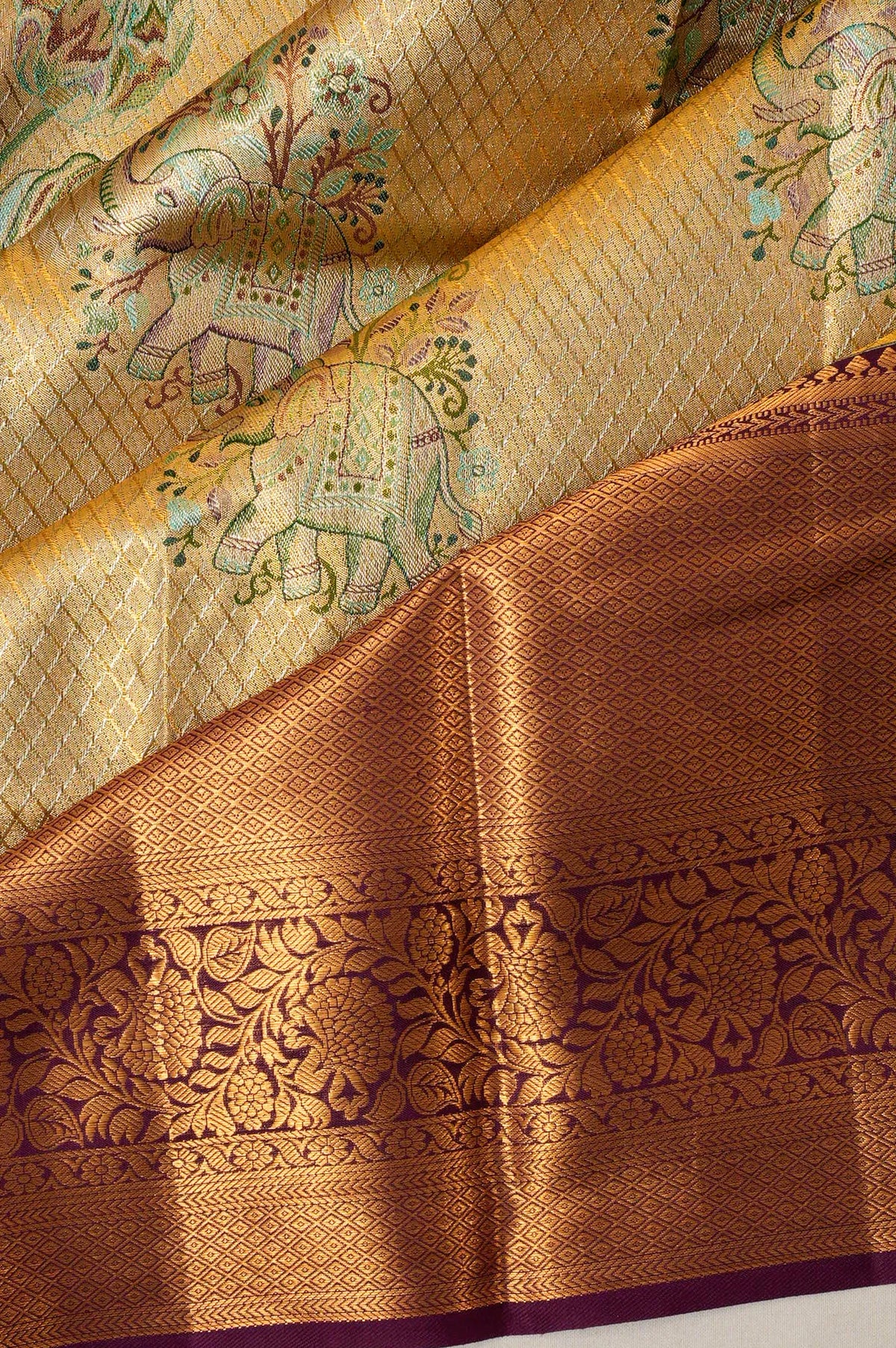 Kanchipuram Silk Tissue Brocade And Butta Gold Saree