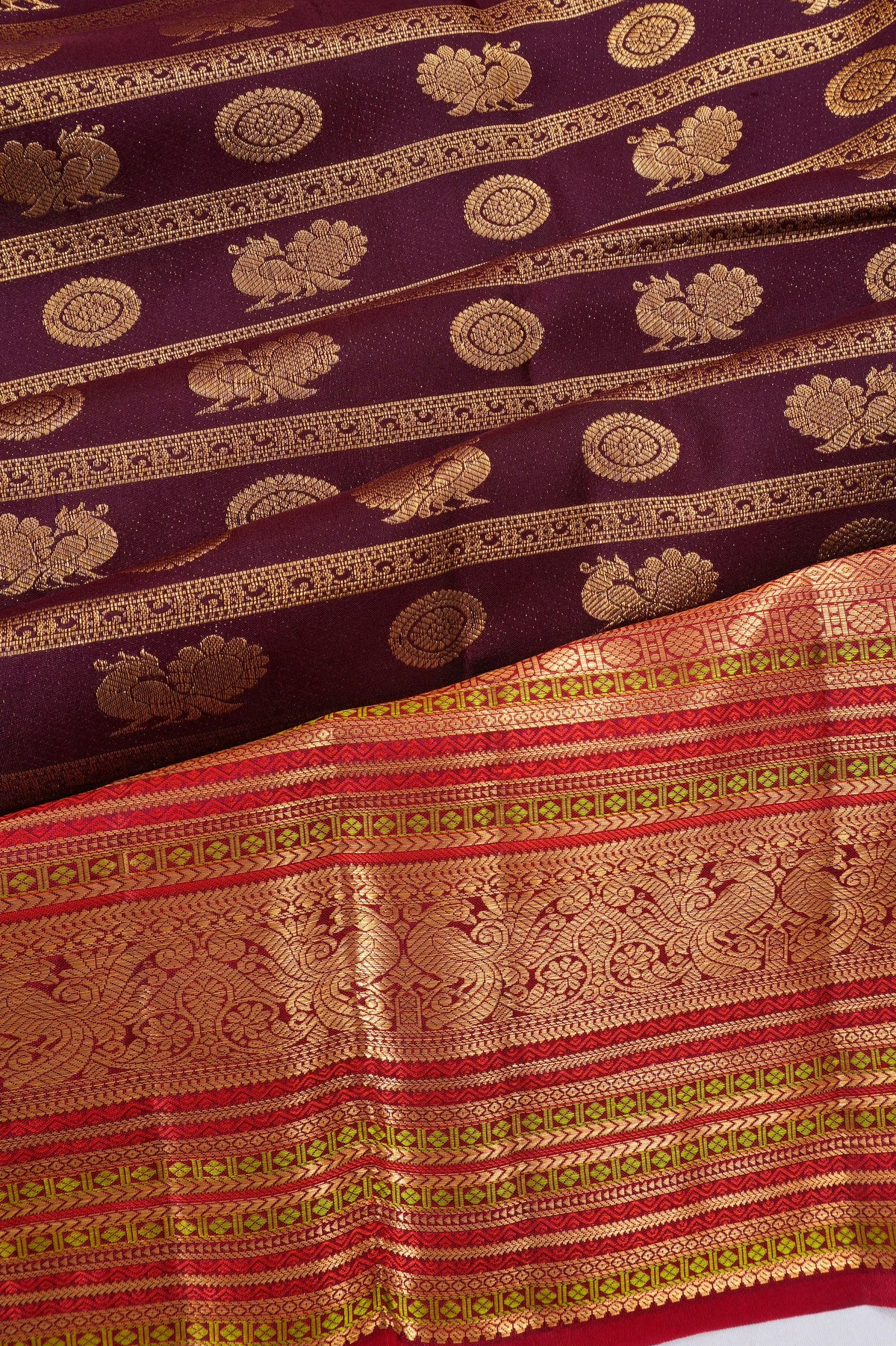 Taranga Kanchi Silk Lines And Butta Maroon Saree