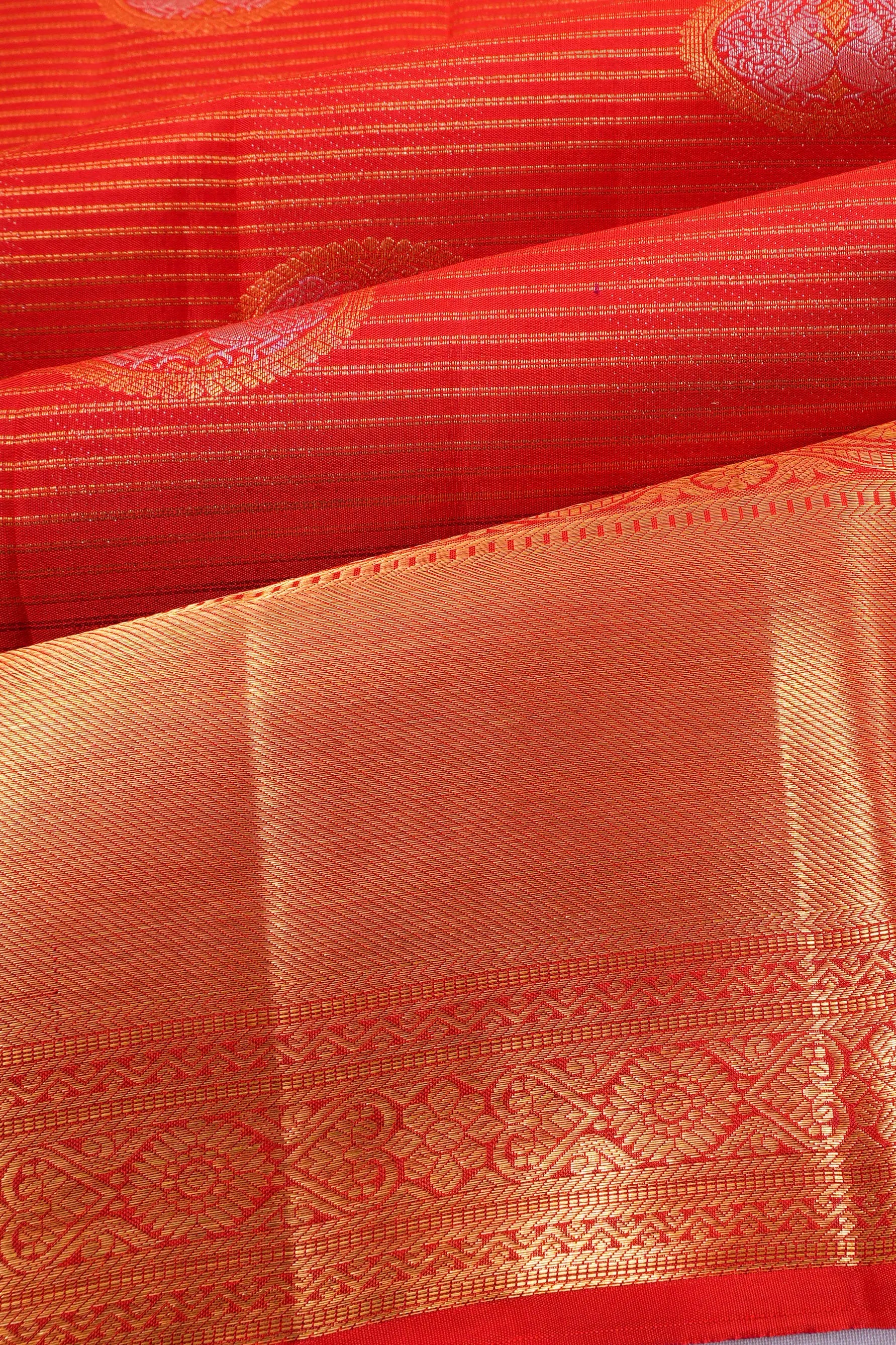 Taranga Kanchi Silk Lines And Butta Orange Saree