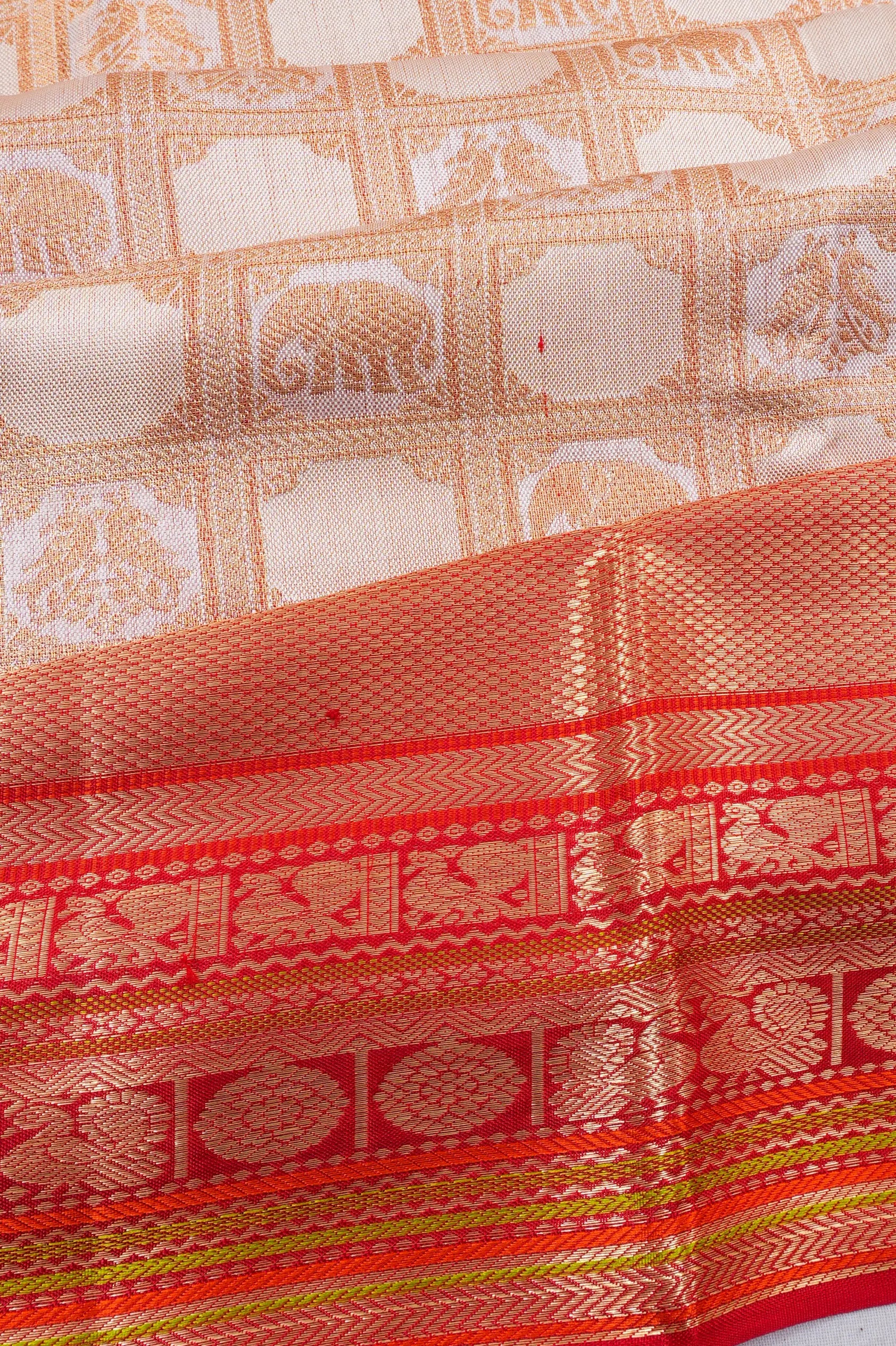 Taranga Kanchi Silk Checks And Butta Cream Saree