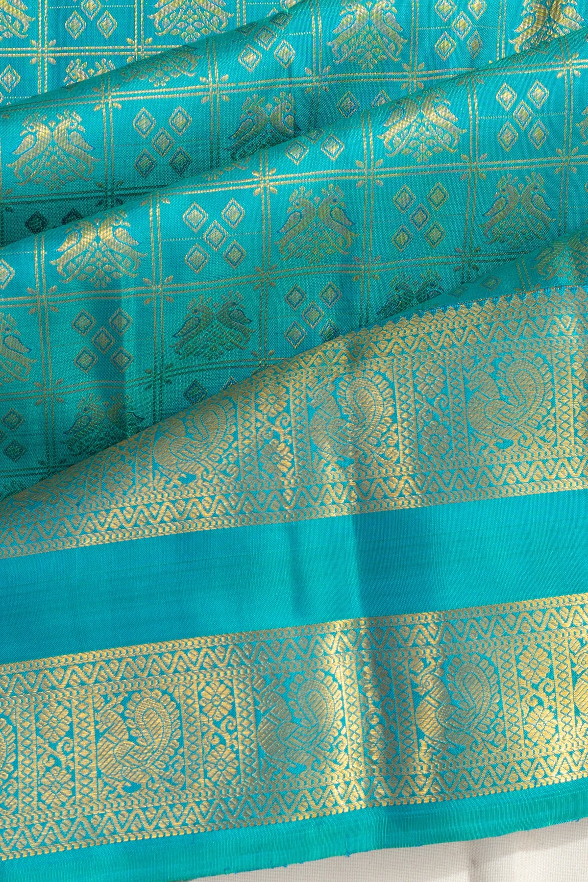 Taranga Kanchi Silk Checks And Butta Blue Saree